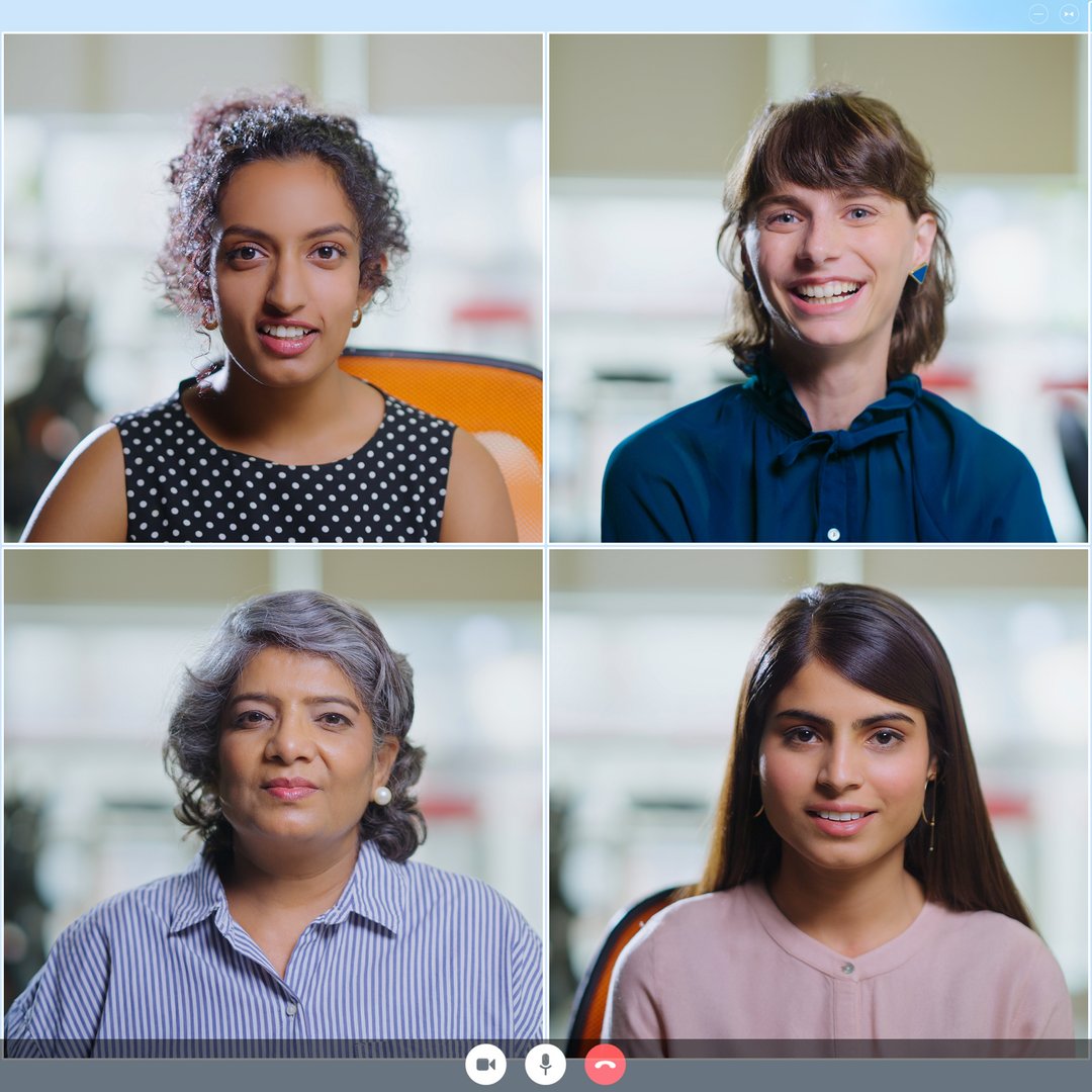 Indian diverse female friends virtual chatting making online video call communication look cam do work from home. Computer screen collage of four happy people group listening conversation on zoom event webinar