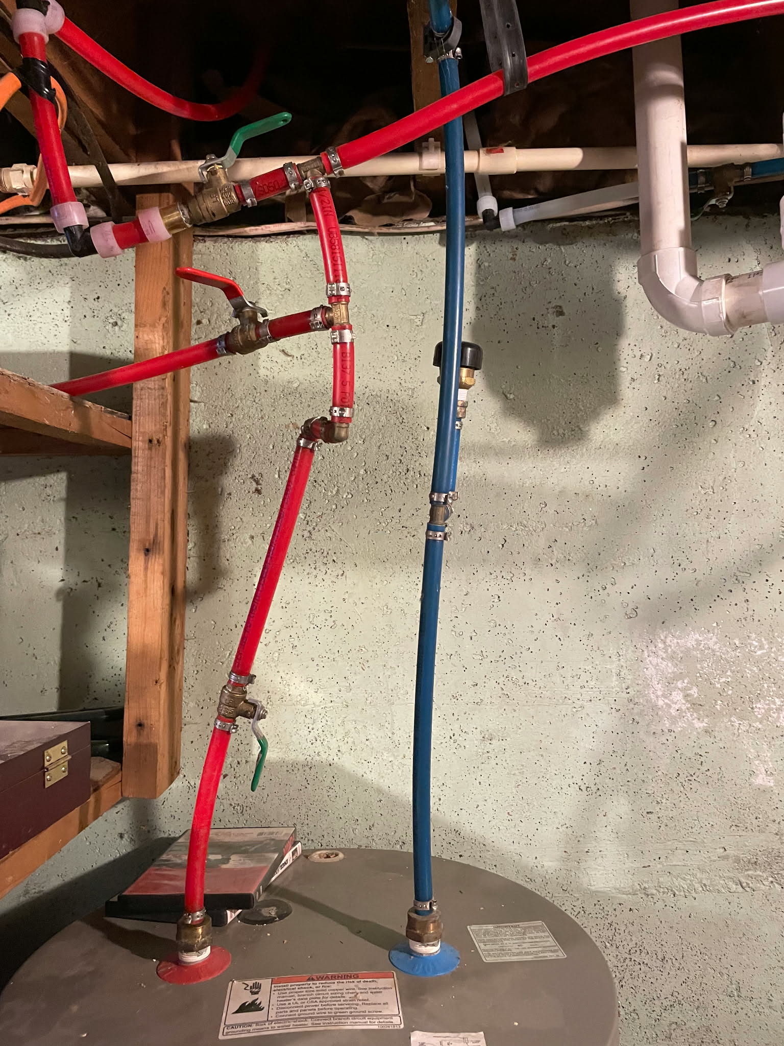 Before - Poor quality PEX water heater installation