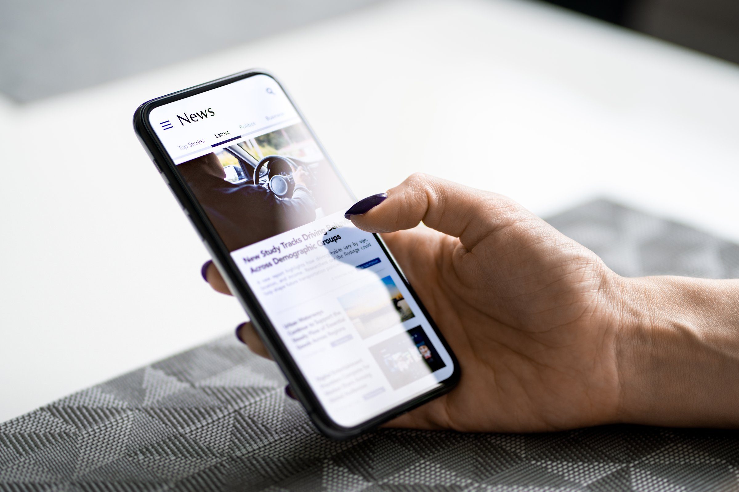 News in phone. Press release in media. Article or headlines. Reading online newspaper in cellphone screen. Latest digital mockup mobile website. Woman using smartphone.