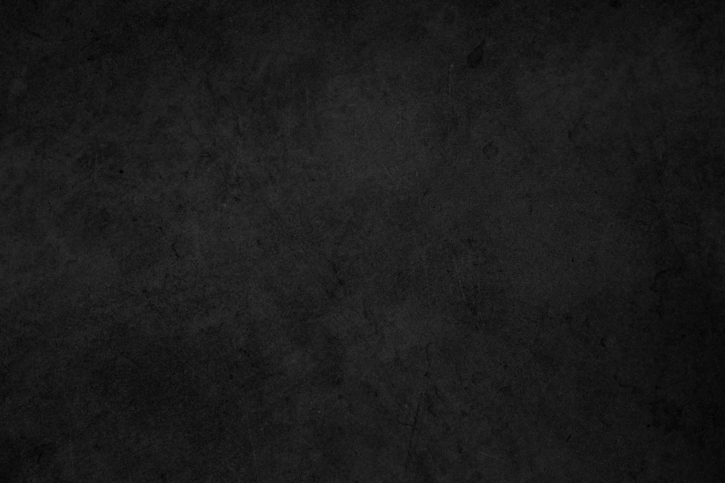 Black dark concrete wall background. Pattern board cement texture grunge dirty scratched for show anthracite promote product urban floor and abstract paper design element decor. Blackboard blank.