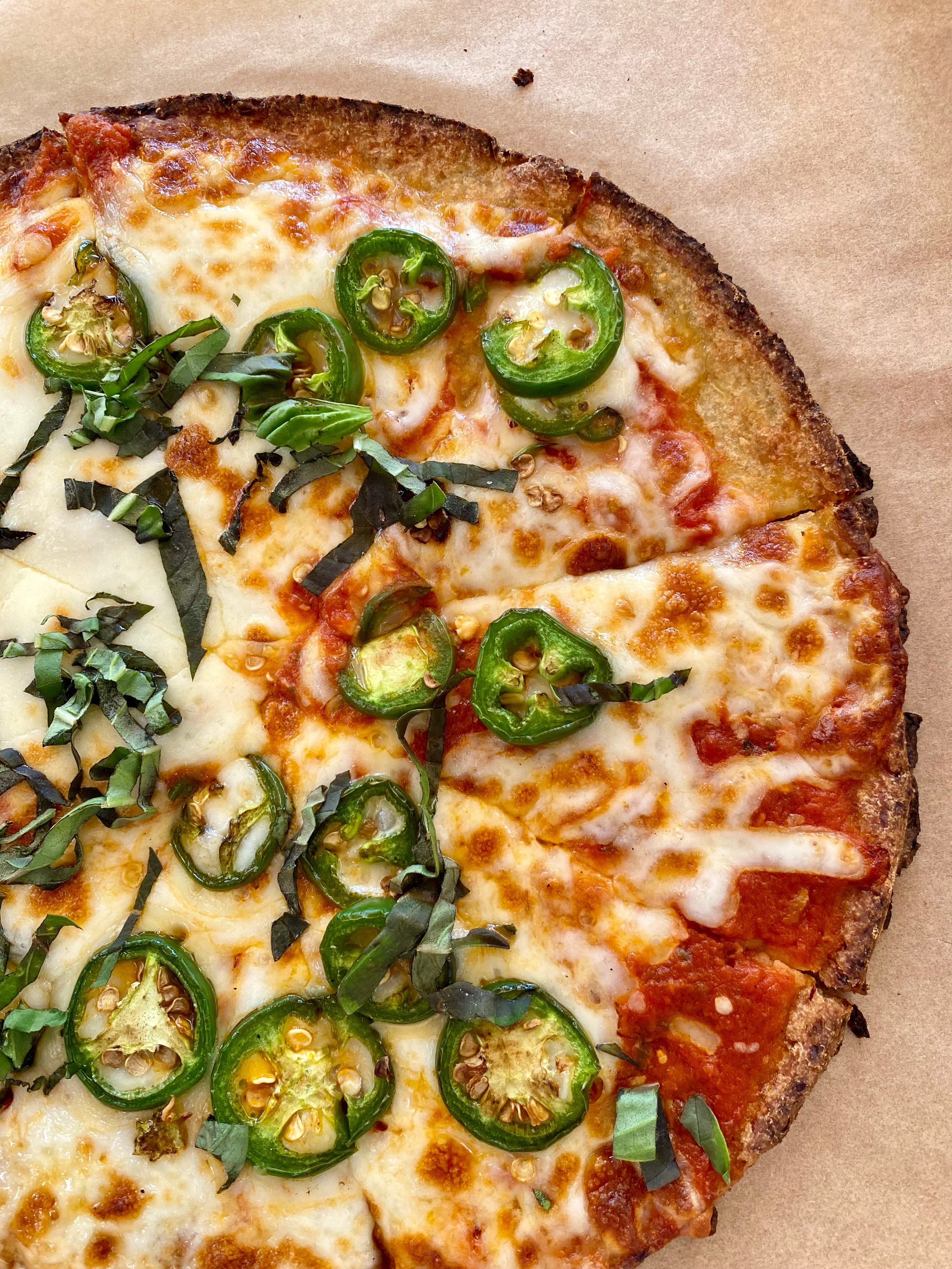 Savor the flavors of Venice Beach with this delectable image of a pizza