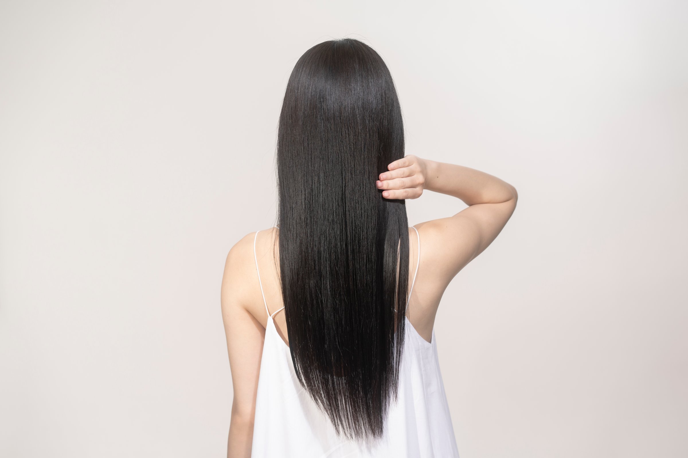 Beauty image of a woman with black hair and long hair