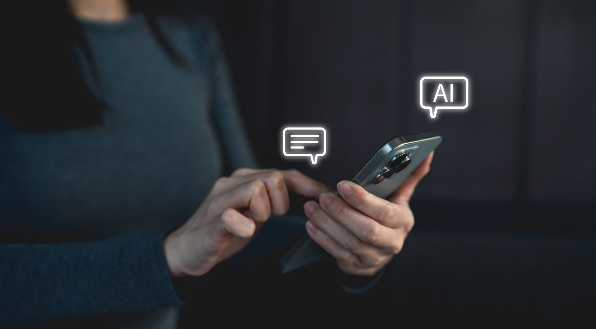 A person interacts with a smartphone, displaying chat and AI features, symbolizing modern communication and technology.