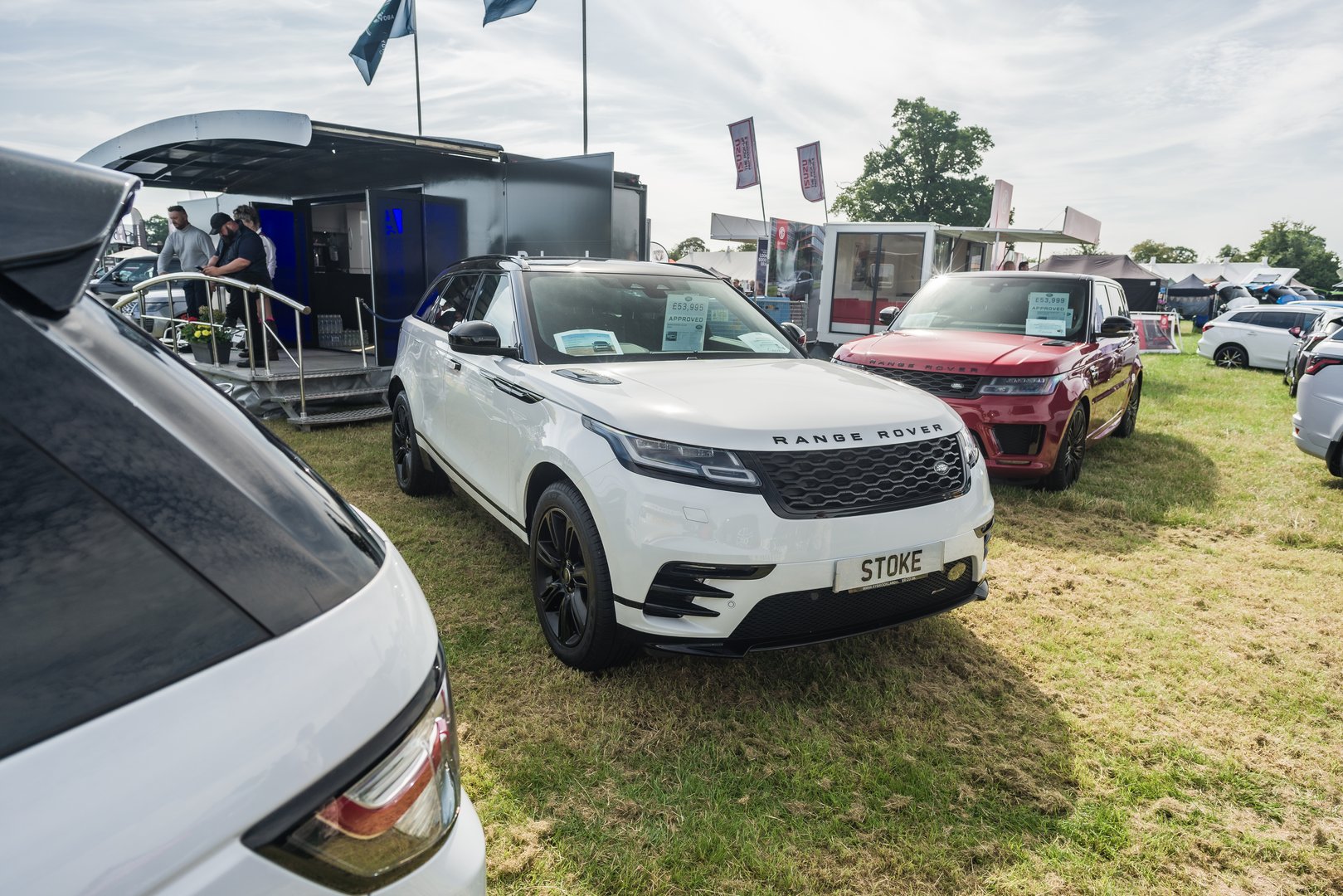 Nantwich, Cheshire, England, July 26th 2023. White Range Rover Velar at a trade show stand.