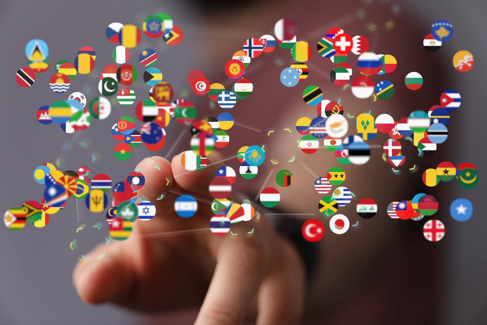 A digital concept of Global communication and international messaging, floating national flags of the world