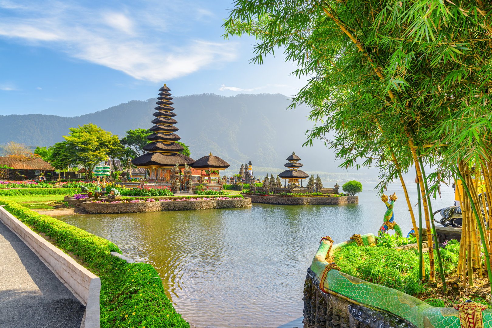 Awesome view of Pura Ulun Danu Beratan (Pura Bratan) in Bali, Indonesia. Amazing Hindu Shaivite temple reflected in water of Lake Beratan. The temple complex is a popular tourist attraction of Asia.
