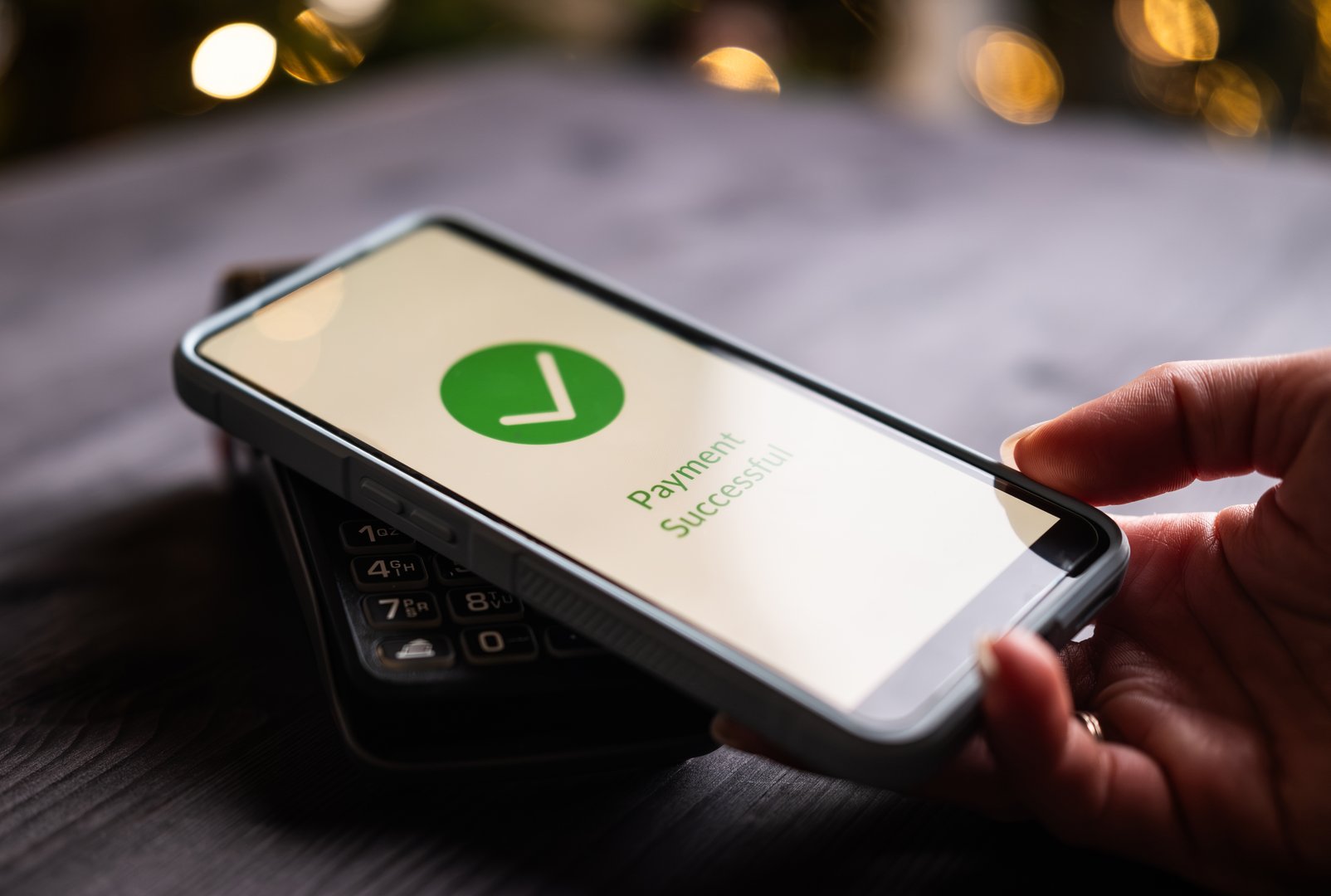 Payment processed and approved on wireless terminal and smartphone