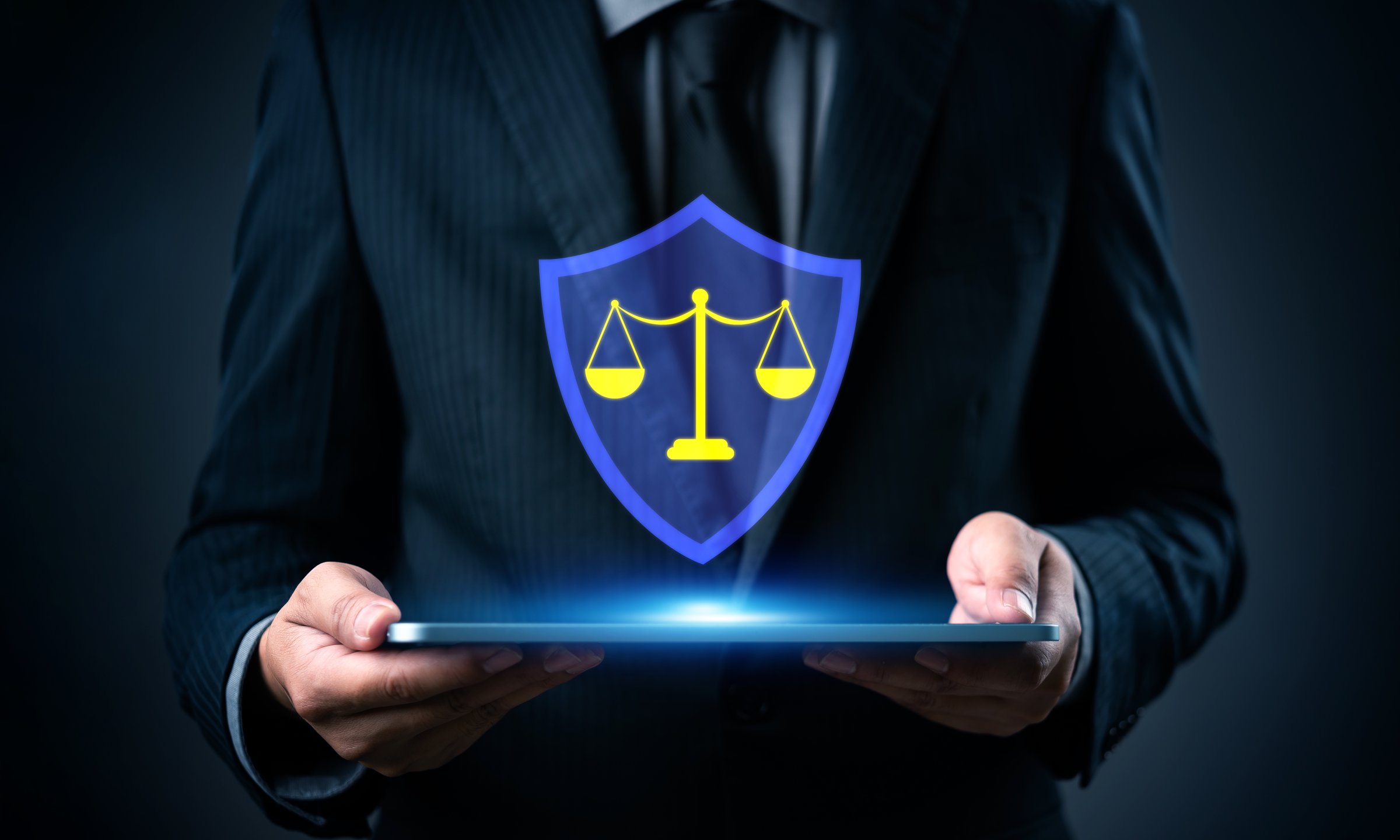 Legal protection concept with law and technology integration showing shield, justice balance, digital security, and privacy rights defense online.