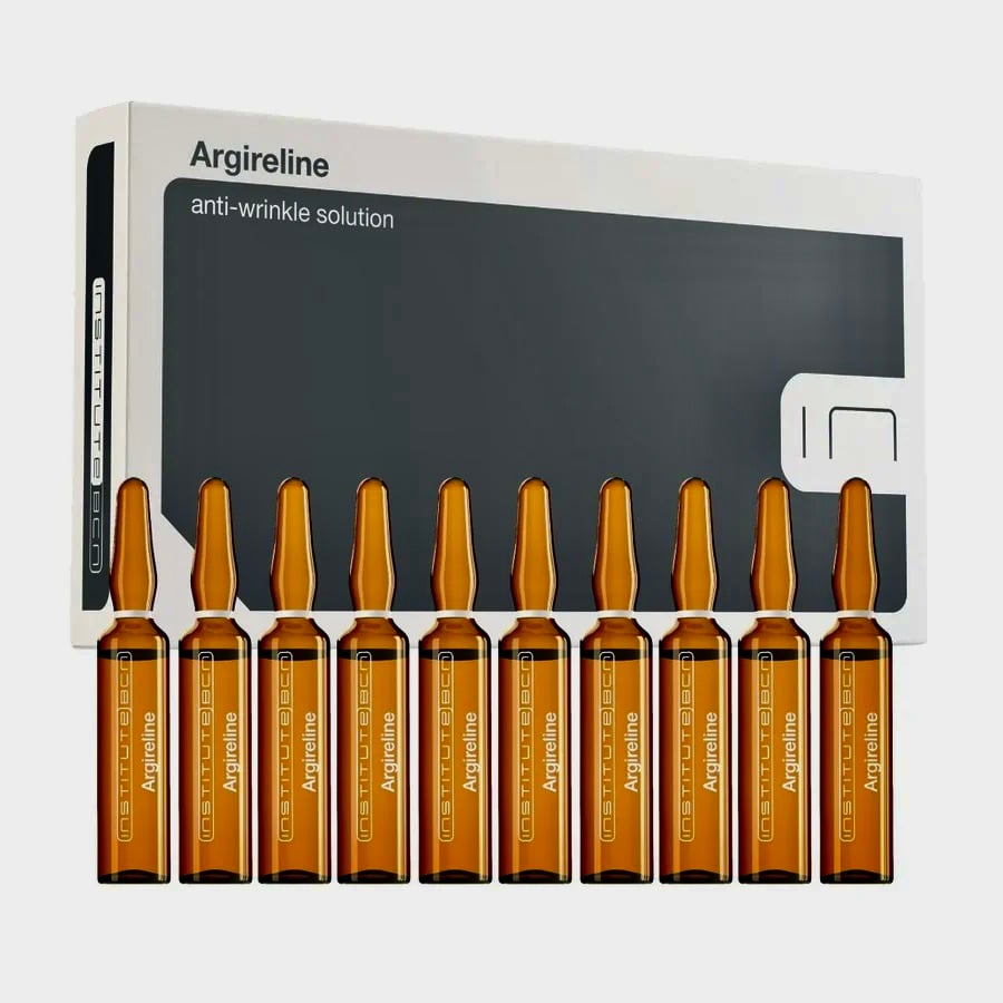 Box of Argireline anti-wrinkle solution with ten brown glass ampoules in front, arranged in a row.