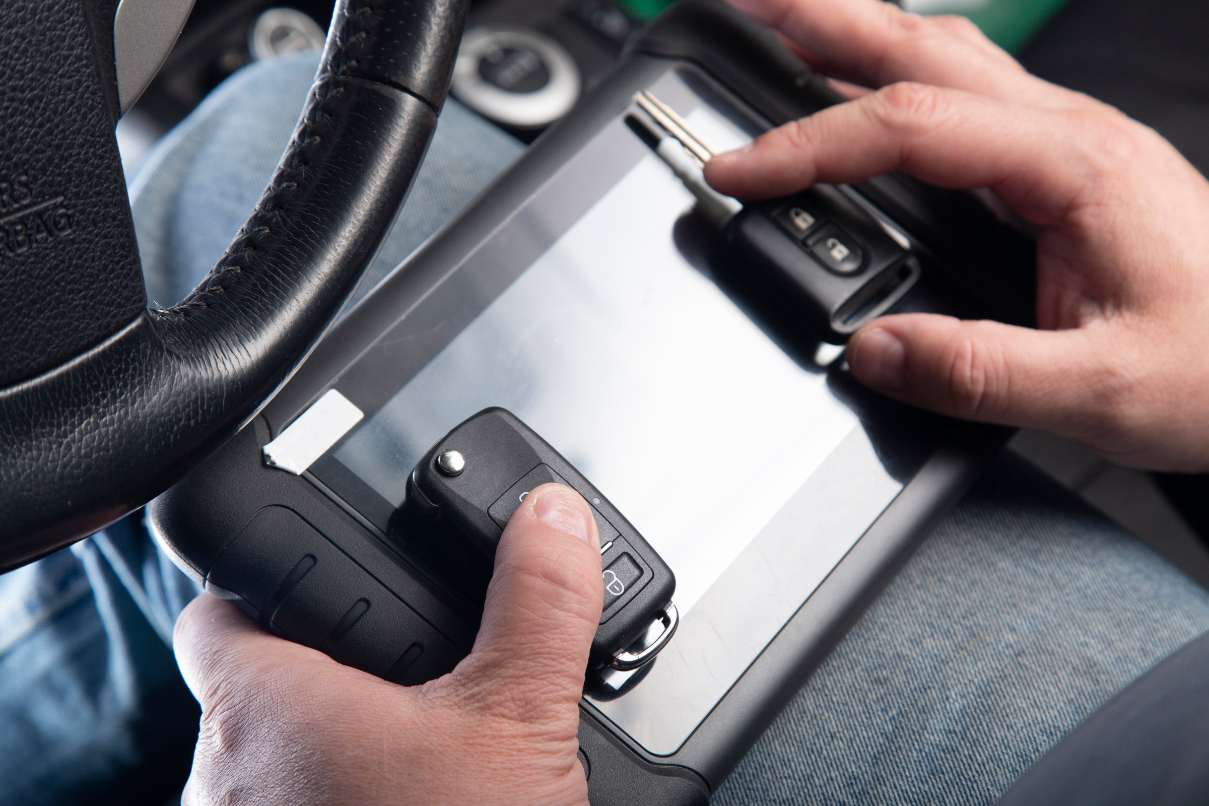 Production of car keys, Programming of car keys and repair.