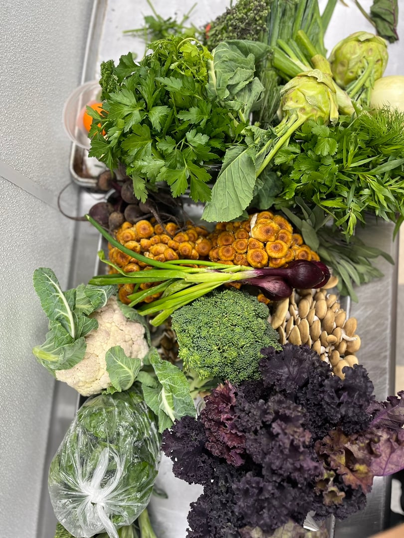 Ember Custom Foods meal prep containers with variety of fresh ingredients