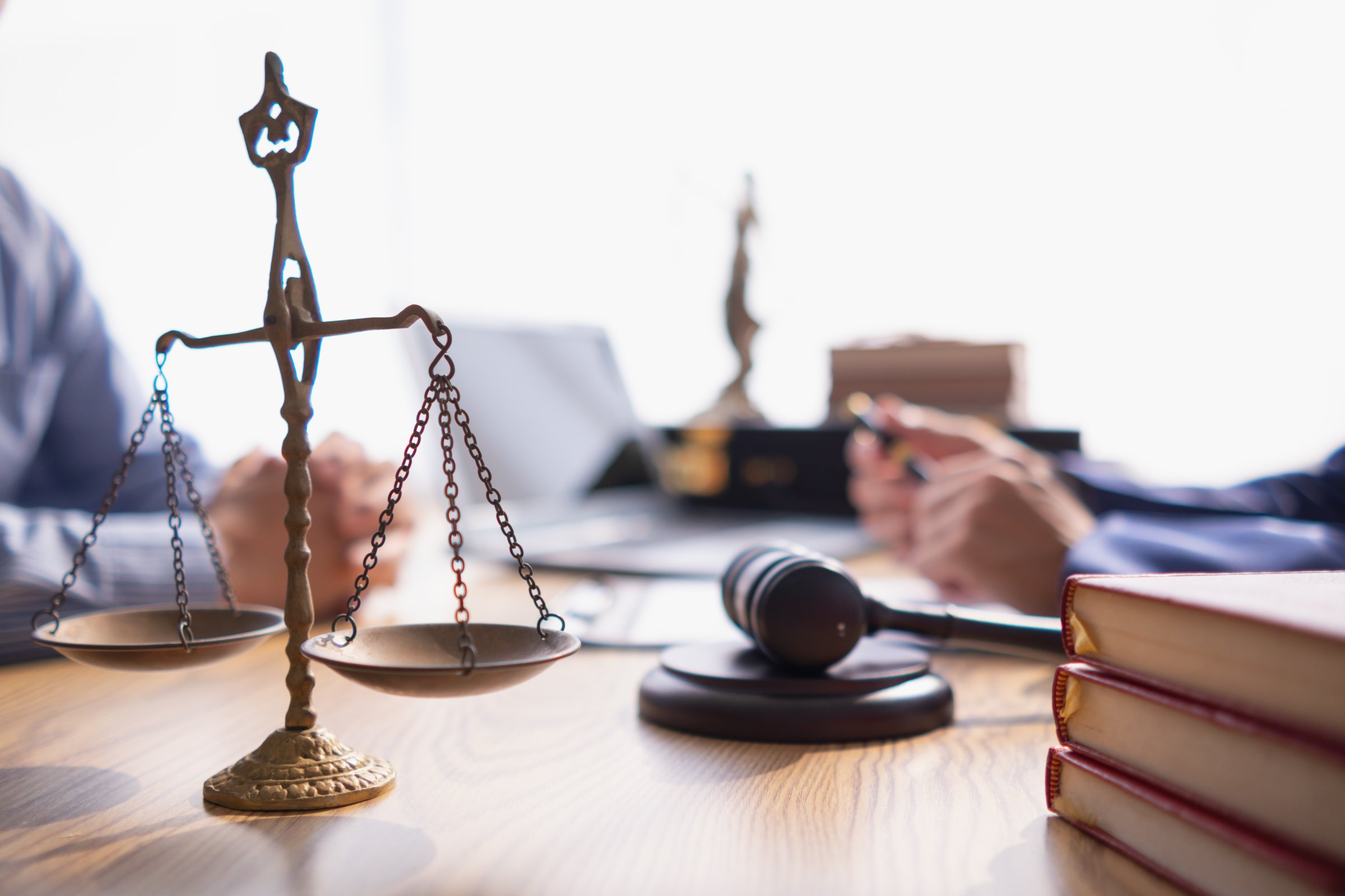 Brass scales are placed on lawyers desks in legal advice offices as a symbol of fairness and integrity in the High Court decision making. Brass scales were used as a symbol of honesty and justice.