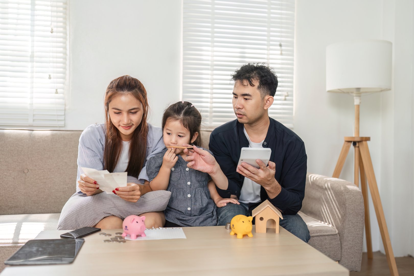 A family discusses financial documents together