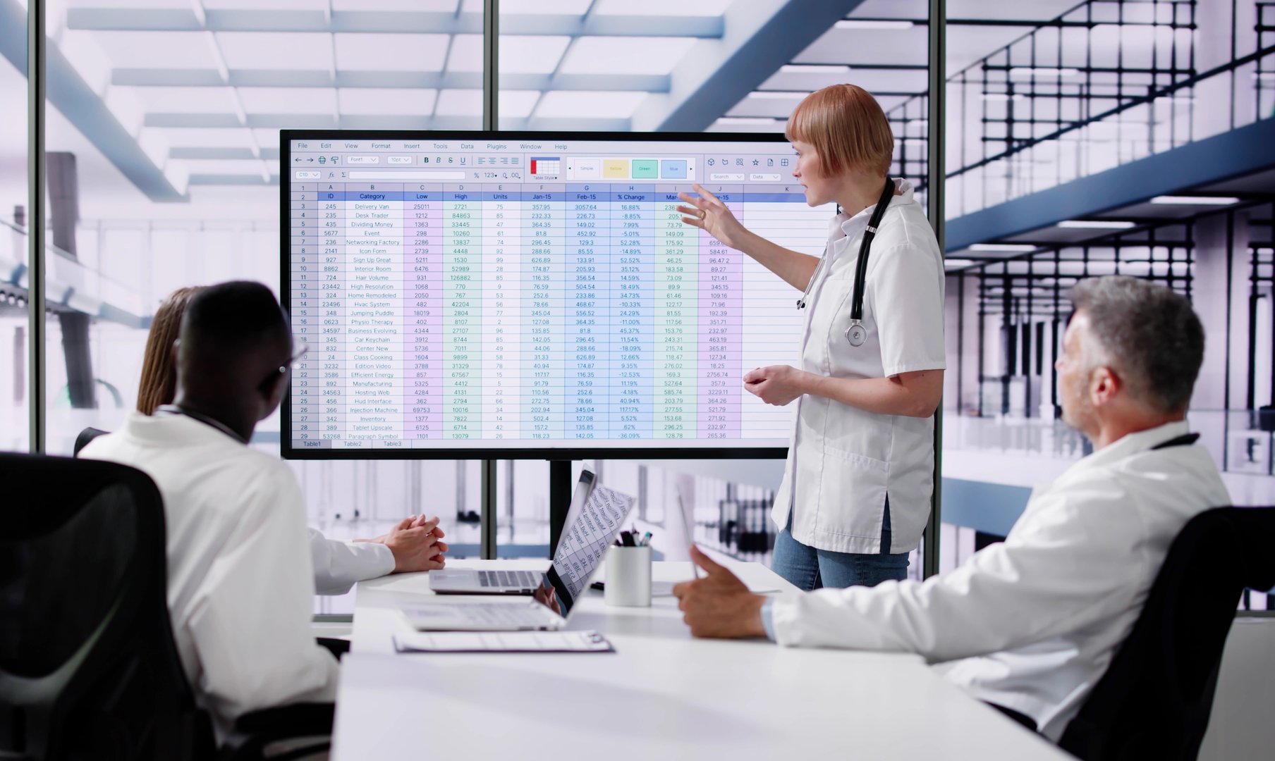 Doctor Showing Medical Codes Training Presentation In Hospital