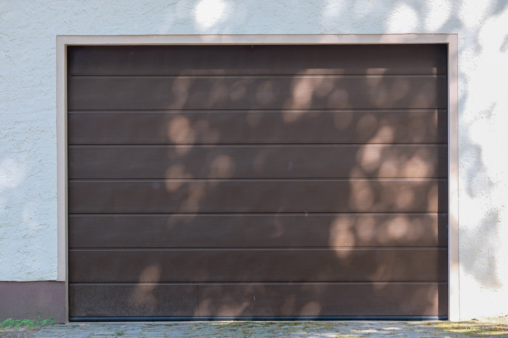 brown garage door made of metal