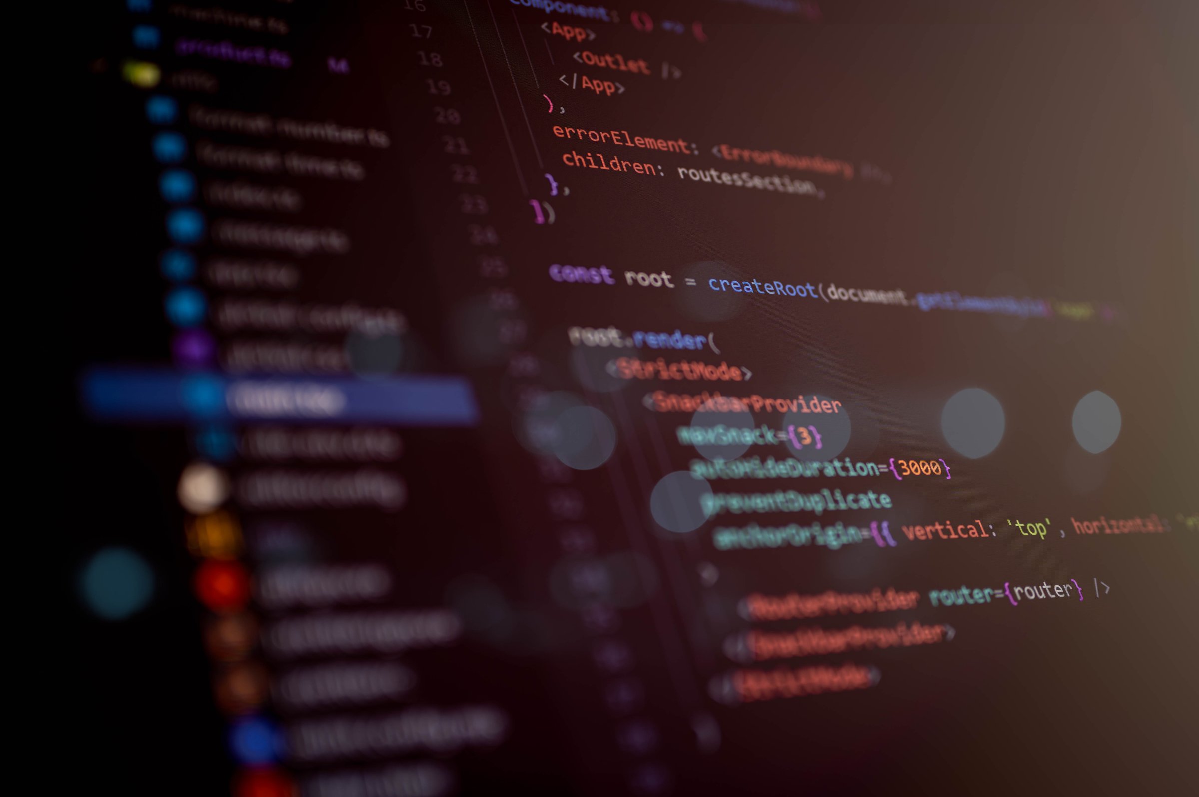 Close-up of React code showing app rendering with createRoot, StrictMode, SnackbarProvider, and RouterProvider in a dark theme editor, ideal for modern frontend developers.