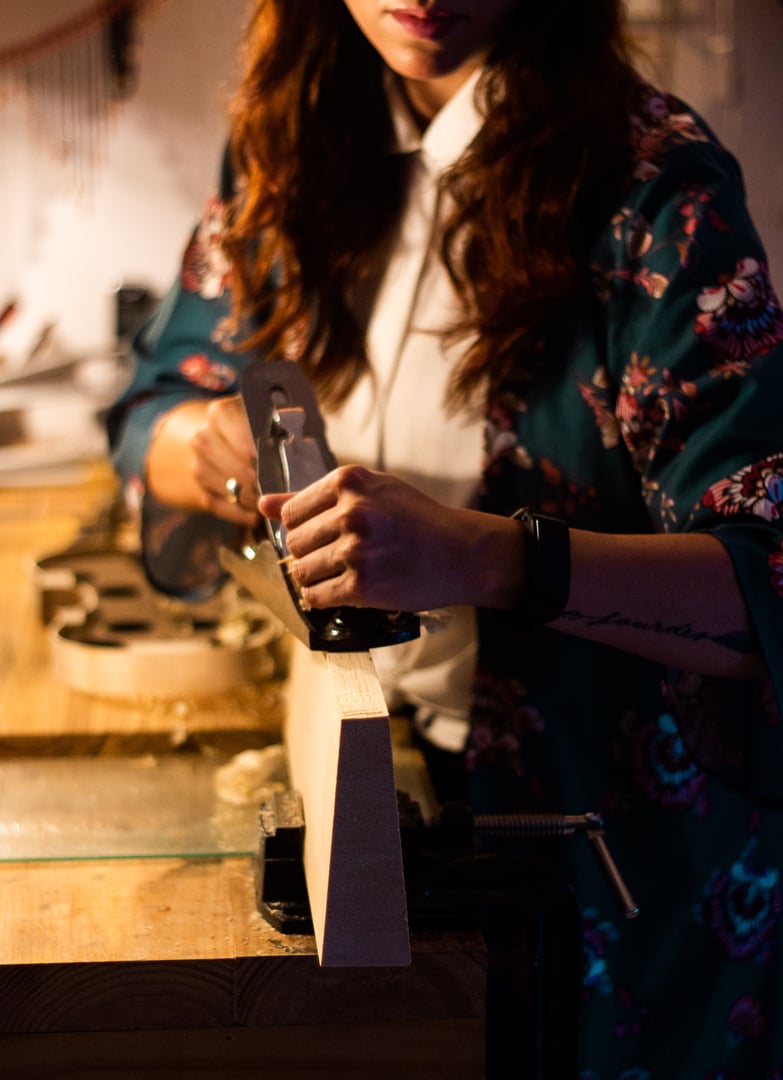 luthier violin maker luthier working with violin mould on center bot, corner blocks , bend ribs for a new classic handmade violin using mold