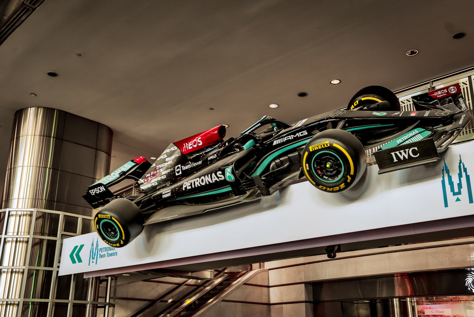 Kuala Lumpur, Malaysia - March 1, 2025: Display of an F1 race car at the entrance to the Suria KLCC mall at the base of the Petronas Towers in Kuala Lumpur, Malaysia