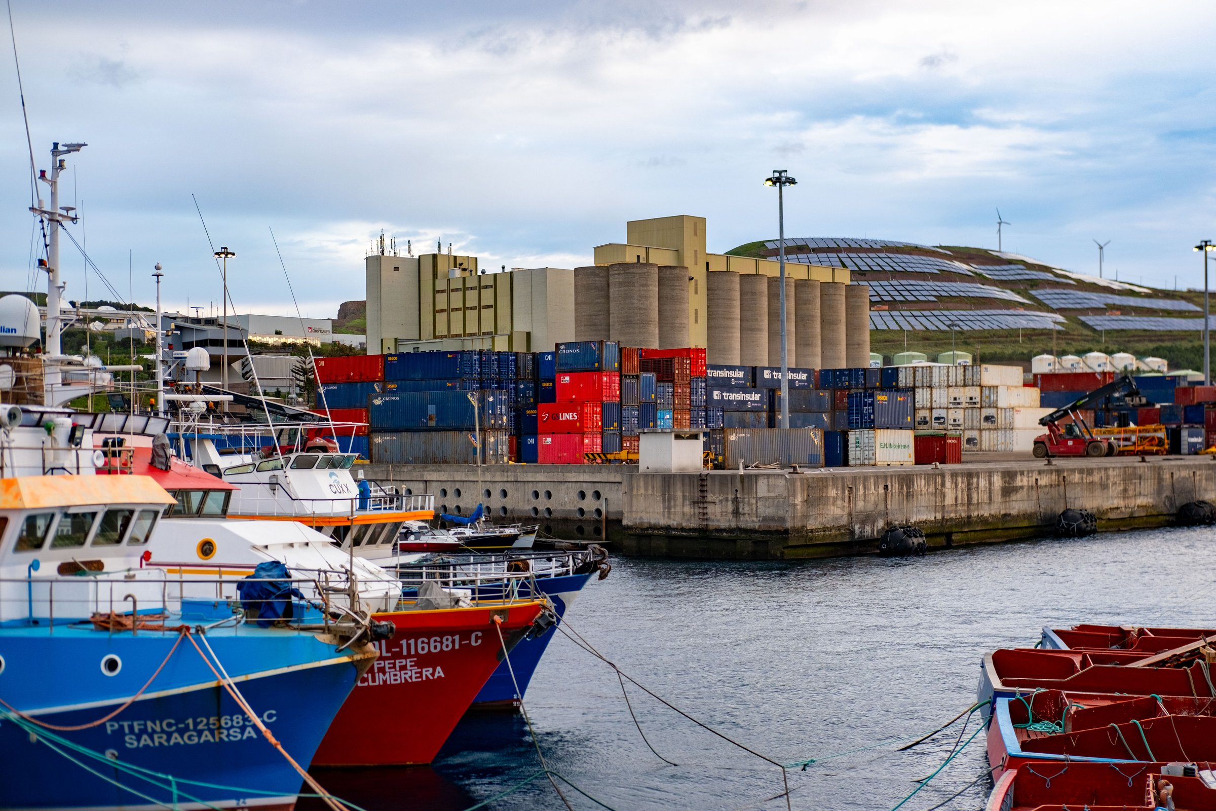Funchal harbor Madeira, boats, containers, coastal port, industry European Transportation and travel destination, vacation, tour tourism on island Madeira, Portugal - January 5, 2025