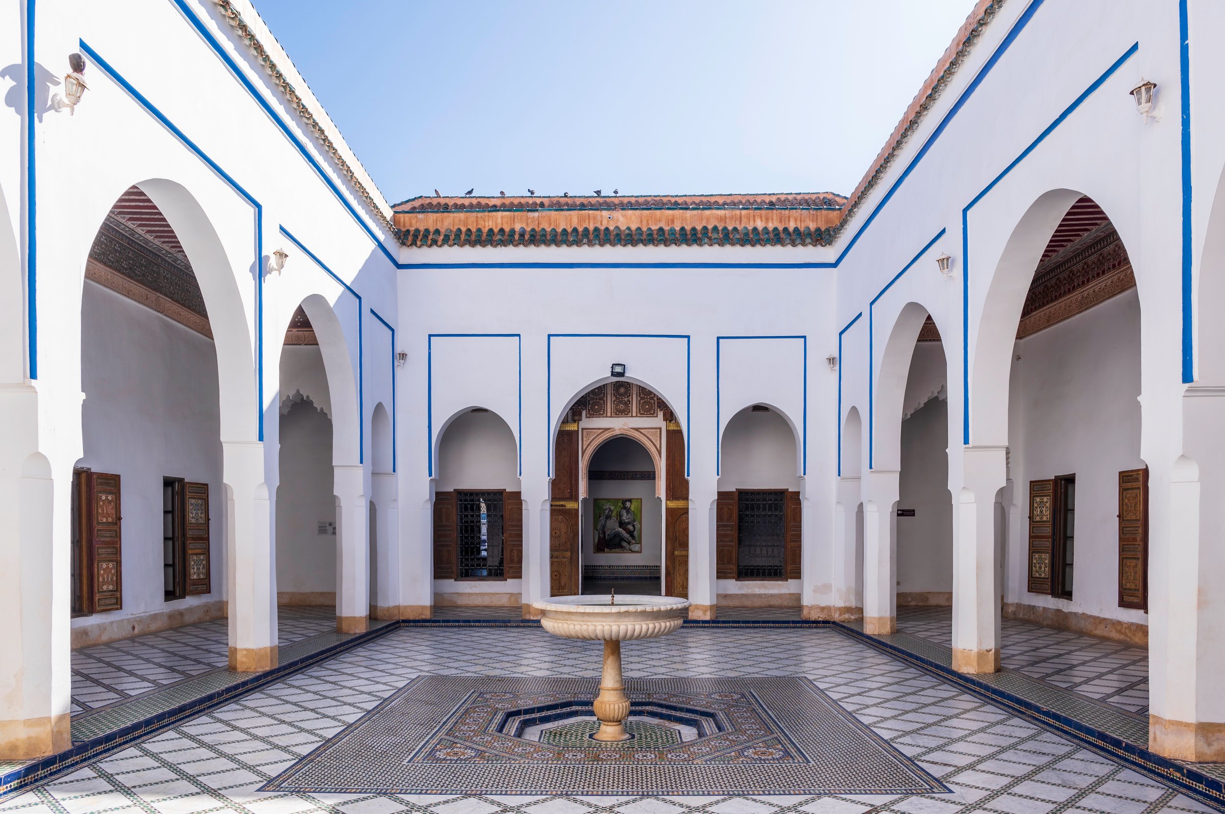 Marrakesh - Bahia Palace. This is an ornate palace, with a series of peaceful inner courtyards, located in Marrakesh, Morocco. A central water fountain can be seen in this photo
