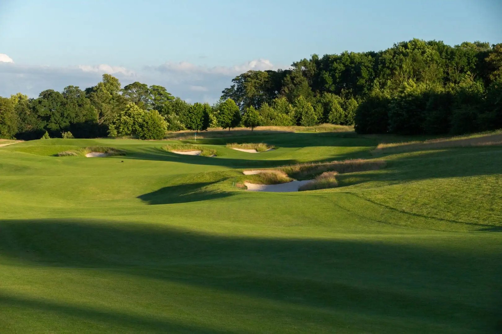 Golf at The Grove championship course with professional facilities