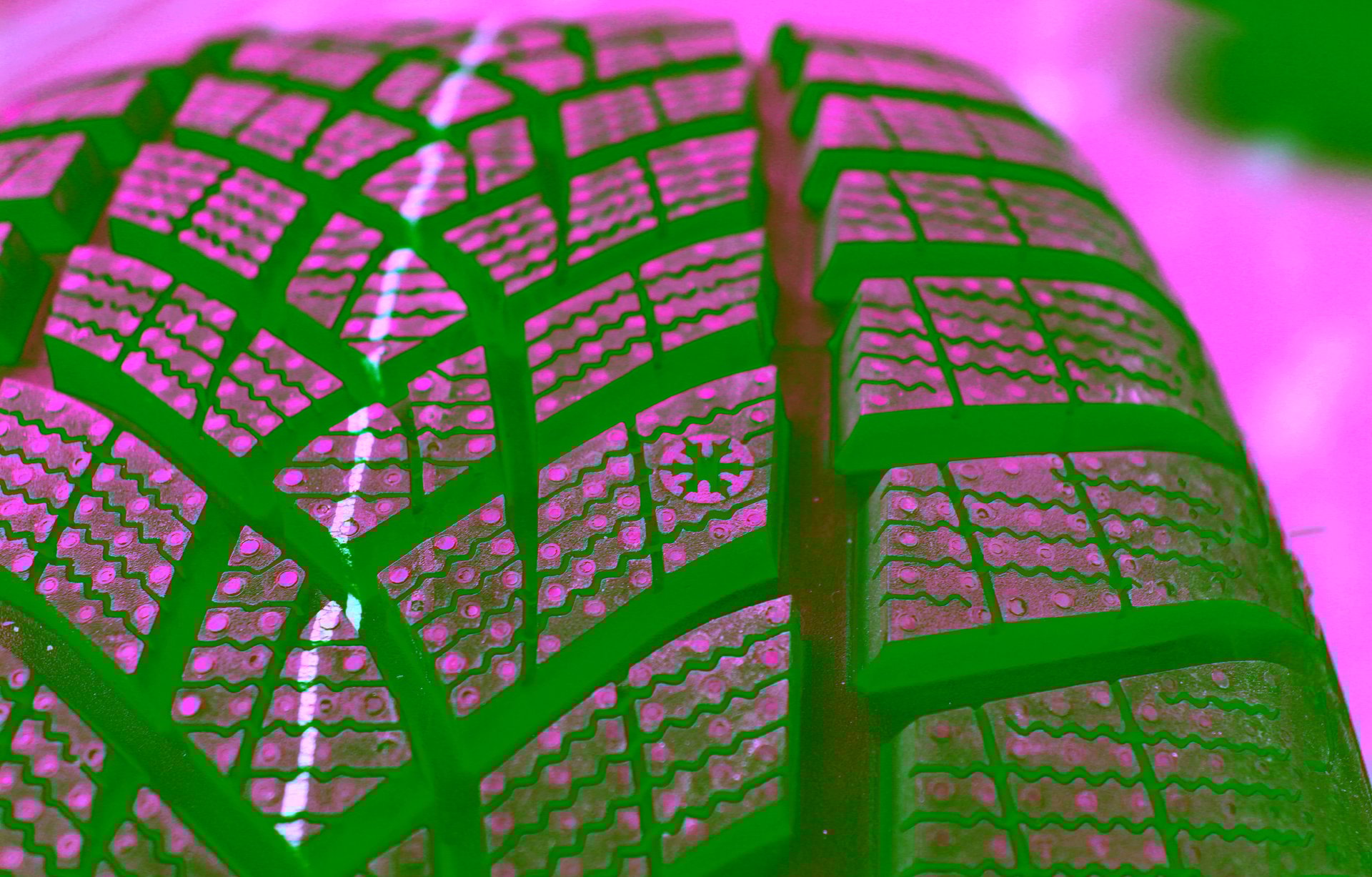 .Winter tyre for safe driving. Snow tyre with aggressive tread pattern