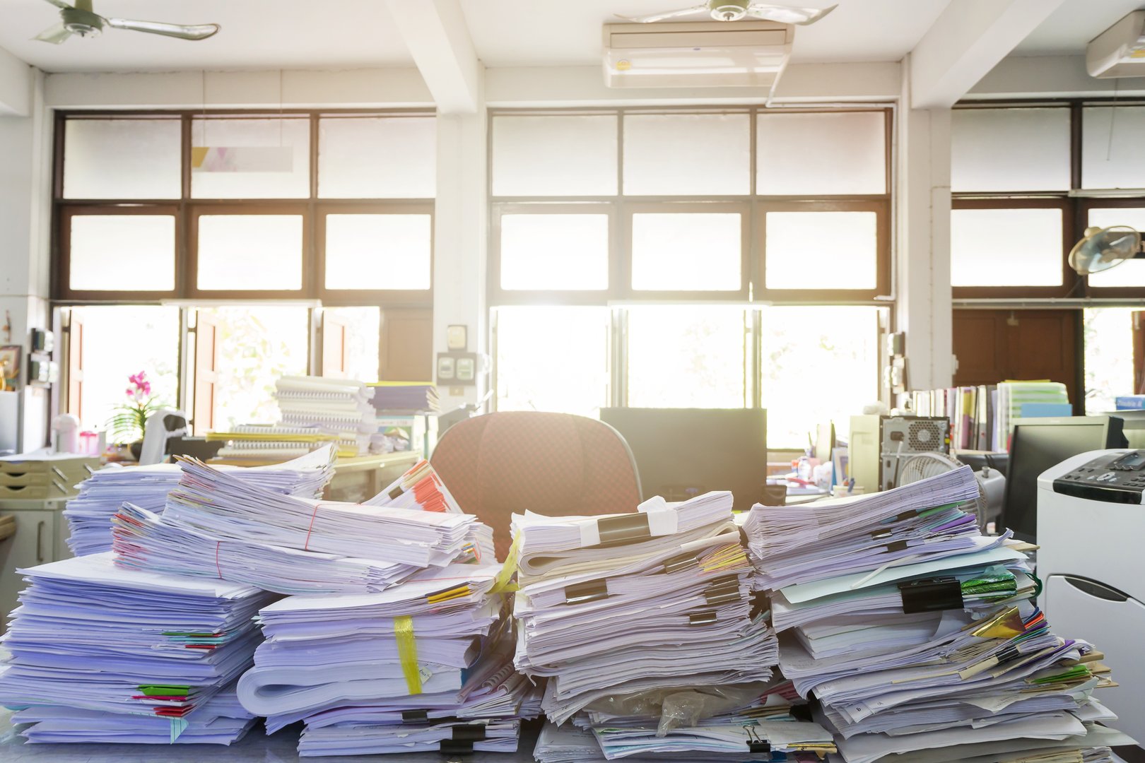Business Concept, Pile of unfinished documents on office desk, Stack of business paper