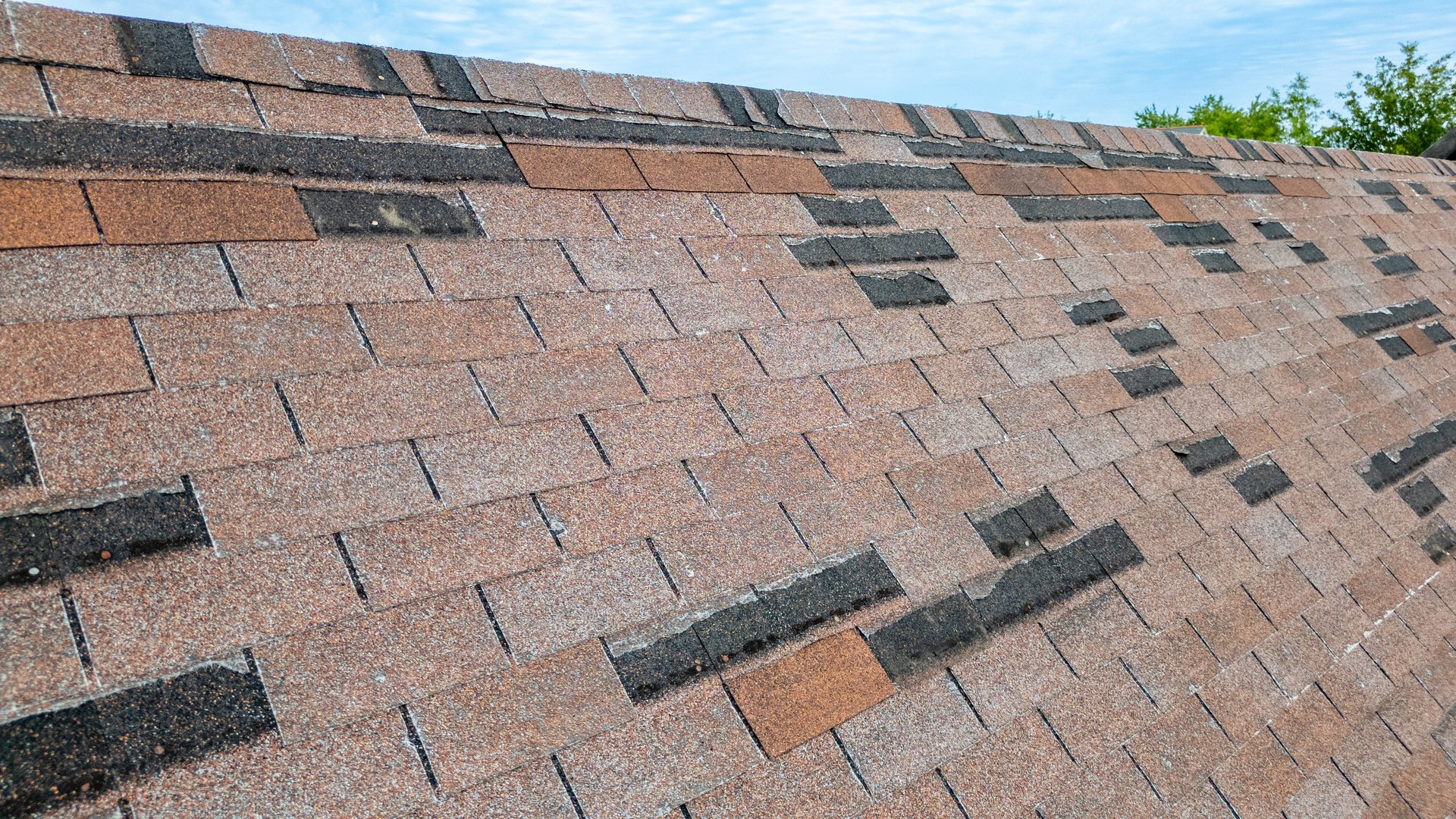 Rood in need of repair, missing shingles from storm damage