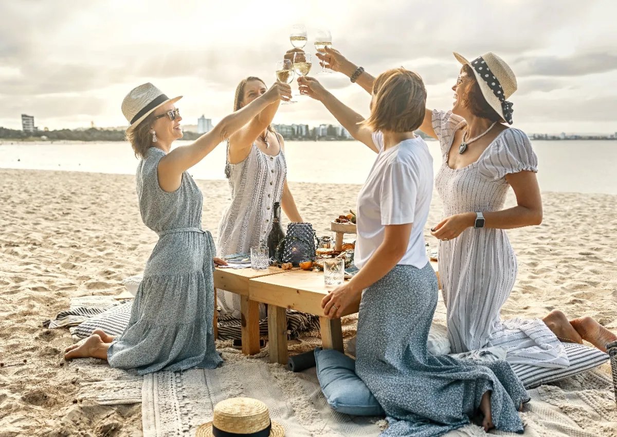 Women celebrating together at a relocation retreat in Spain