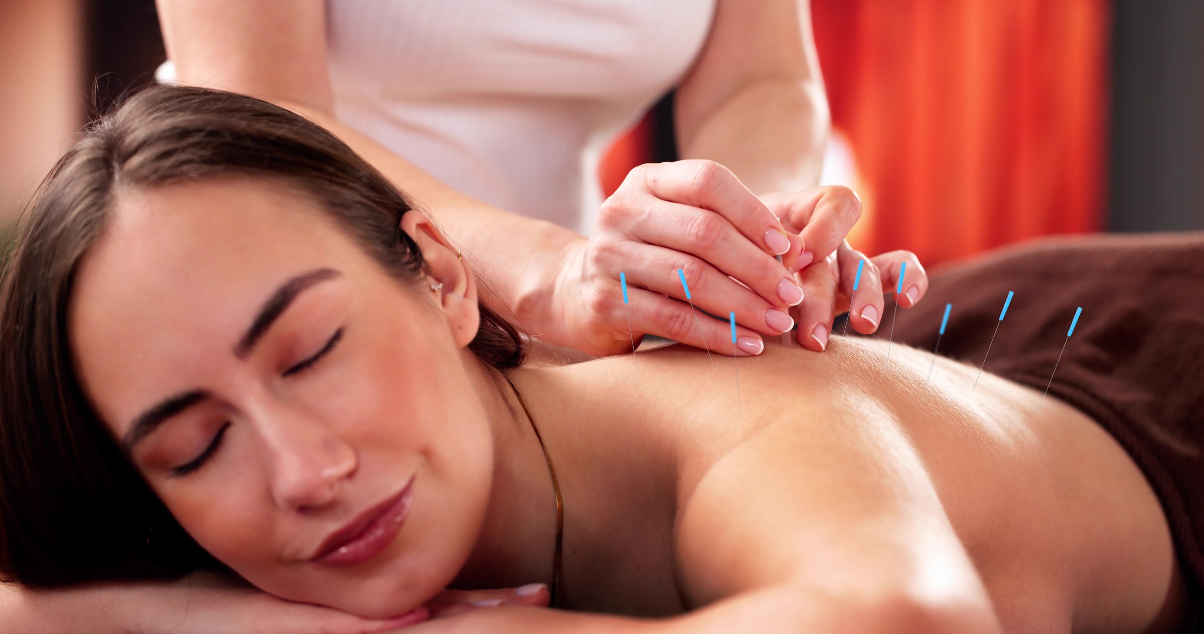 Female Patient Receives Chiropractic Adjustment in Spa Wellness Center