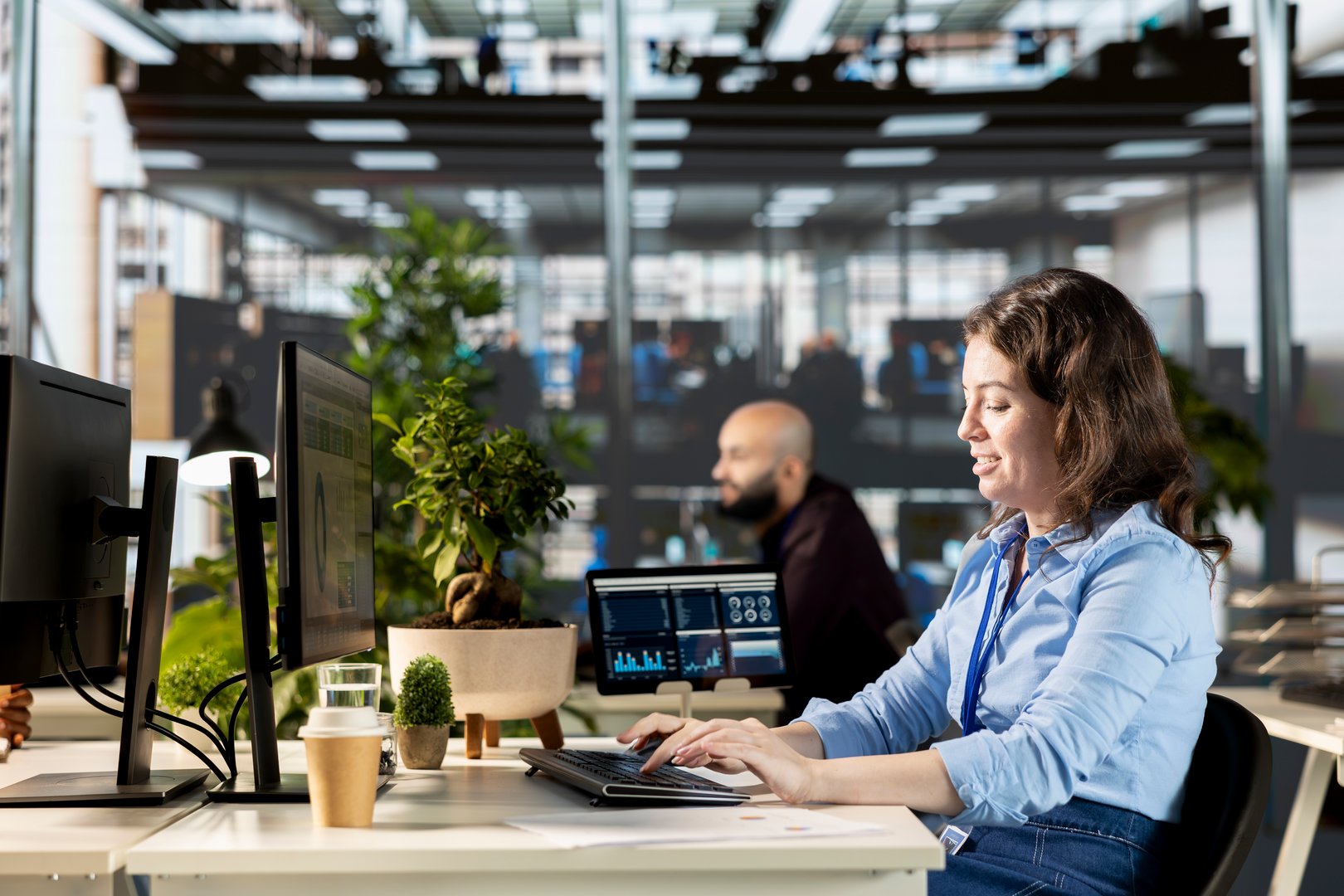 Woman general director overseeing infographics and planning a strategy for business development, performance metrics. Female manager evaluating a financial report online.