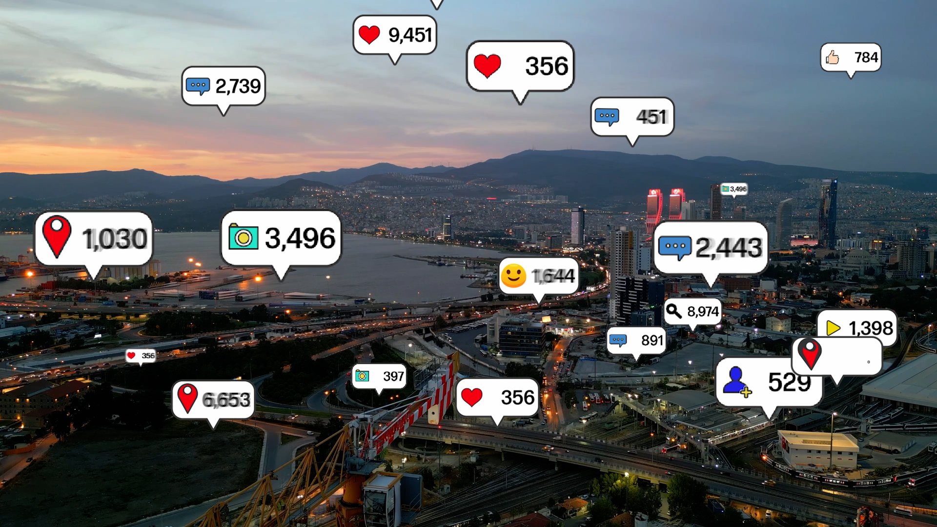 Social media icons fly over city downtown showing people engagement connection through social network application platform . Concept for online community and social media marketing strategy . High quality 4k footage