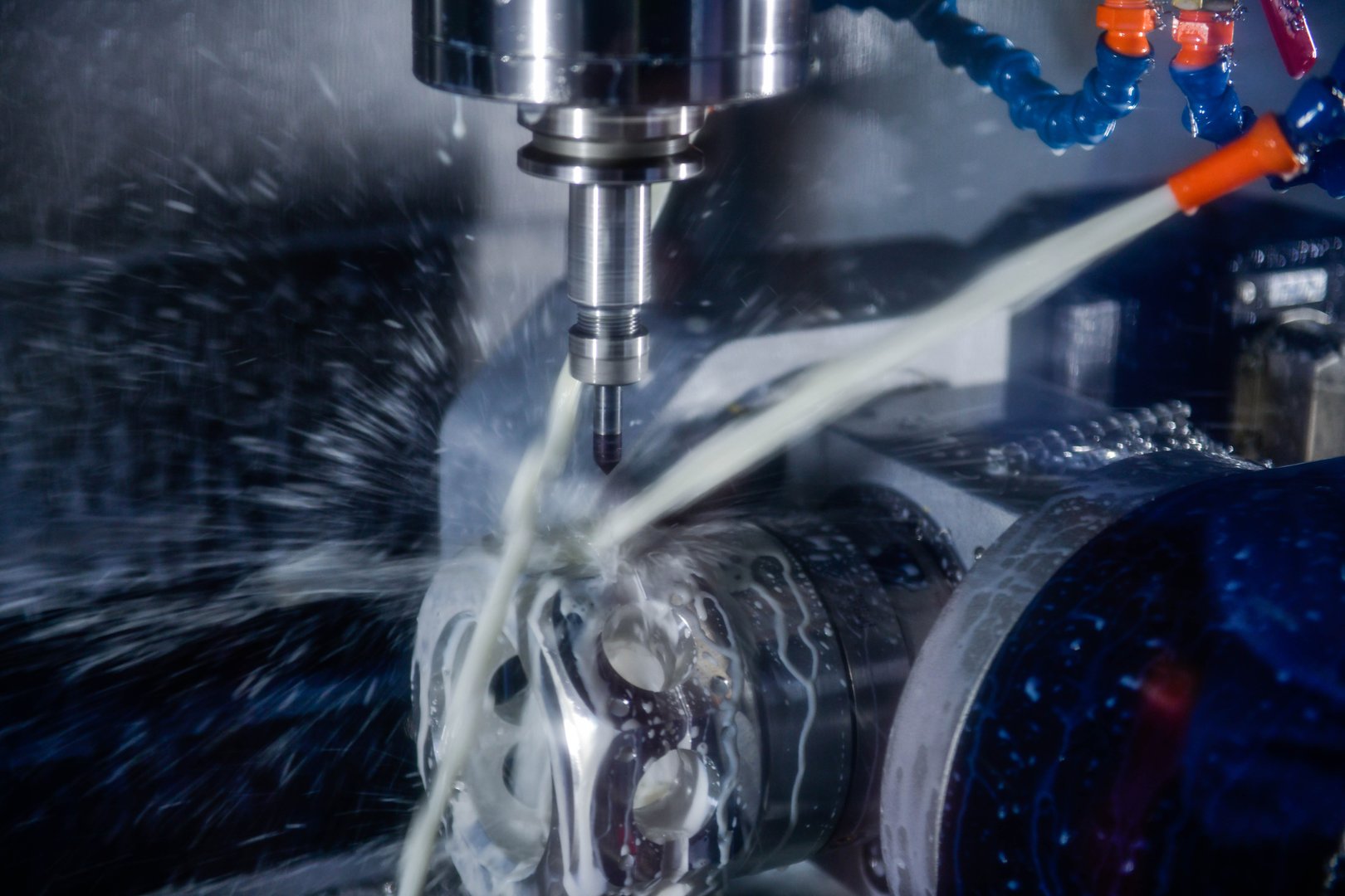 CNC milling machine cutting the mold parts with oil coolant method The mold and die manufacturing process by machining center with the solid ball endmill tools.