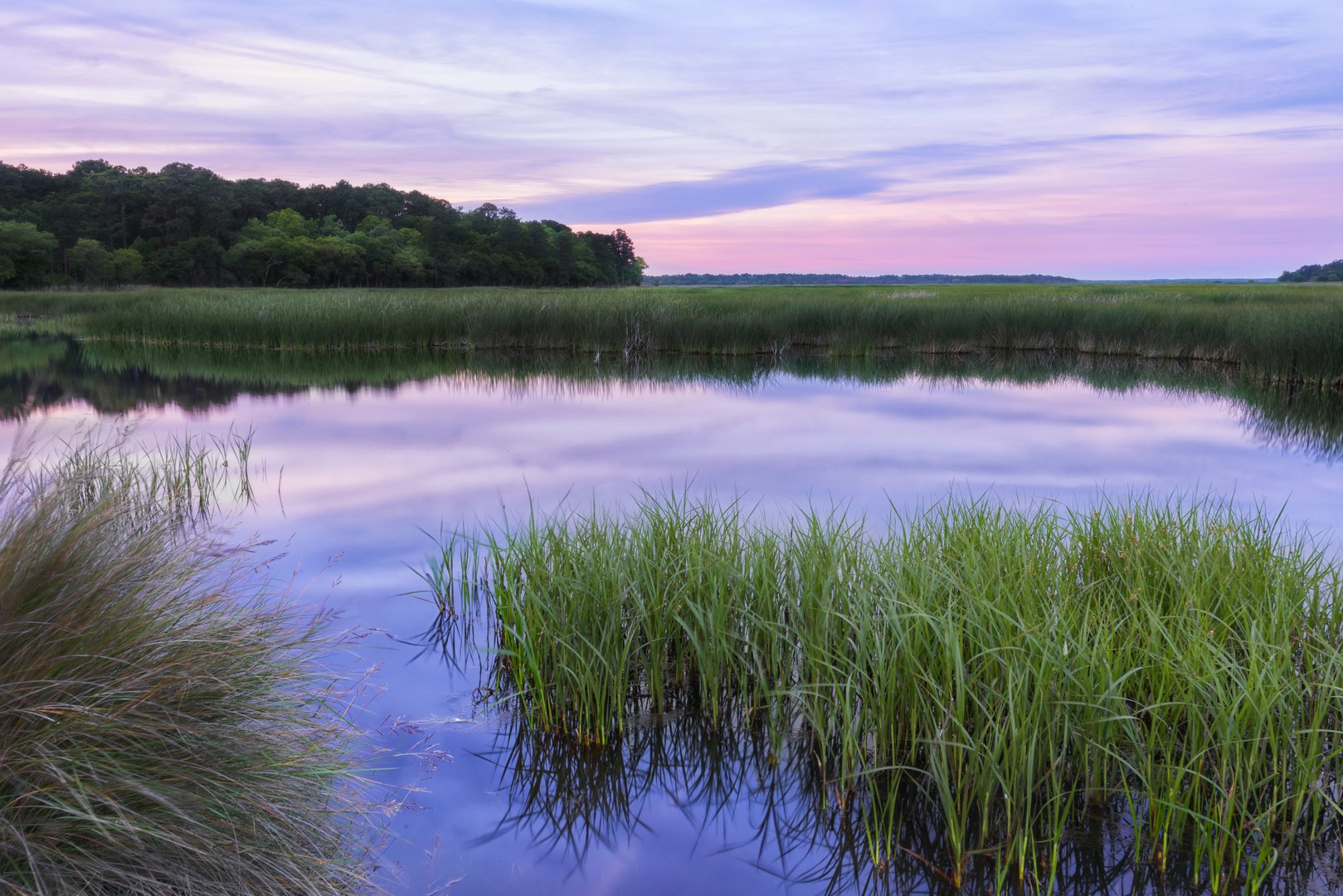 The wetlands surrounding Charleston, South Carolina provide some of the most beautiful scenes for both sunrise and sunset. The big, wide-open, Lowcountry landscapes give way to huge skies and many reflective opportunities within the marshes. The changing of the tide levels allow an array of compositions.