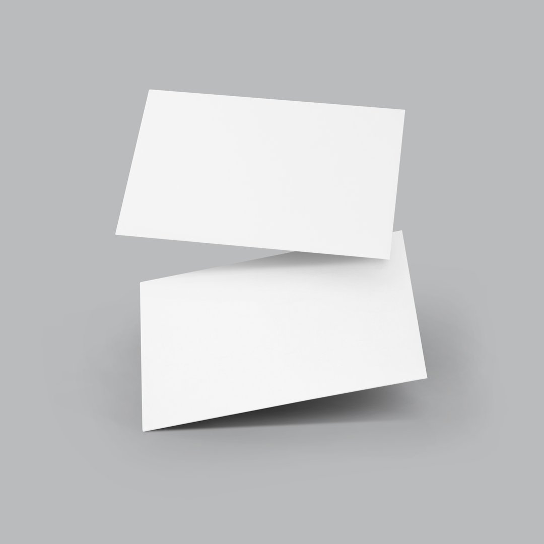 Blank white business cards on gray paper background. Mockup for branding identity