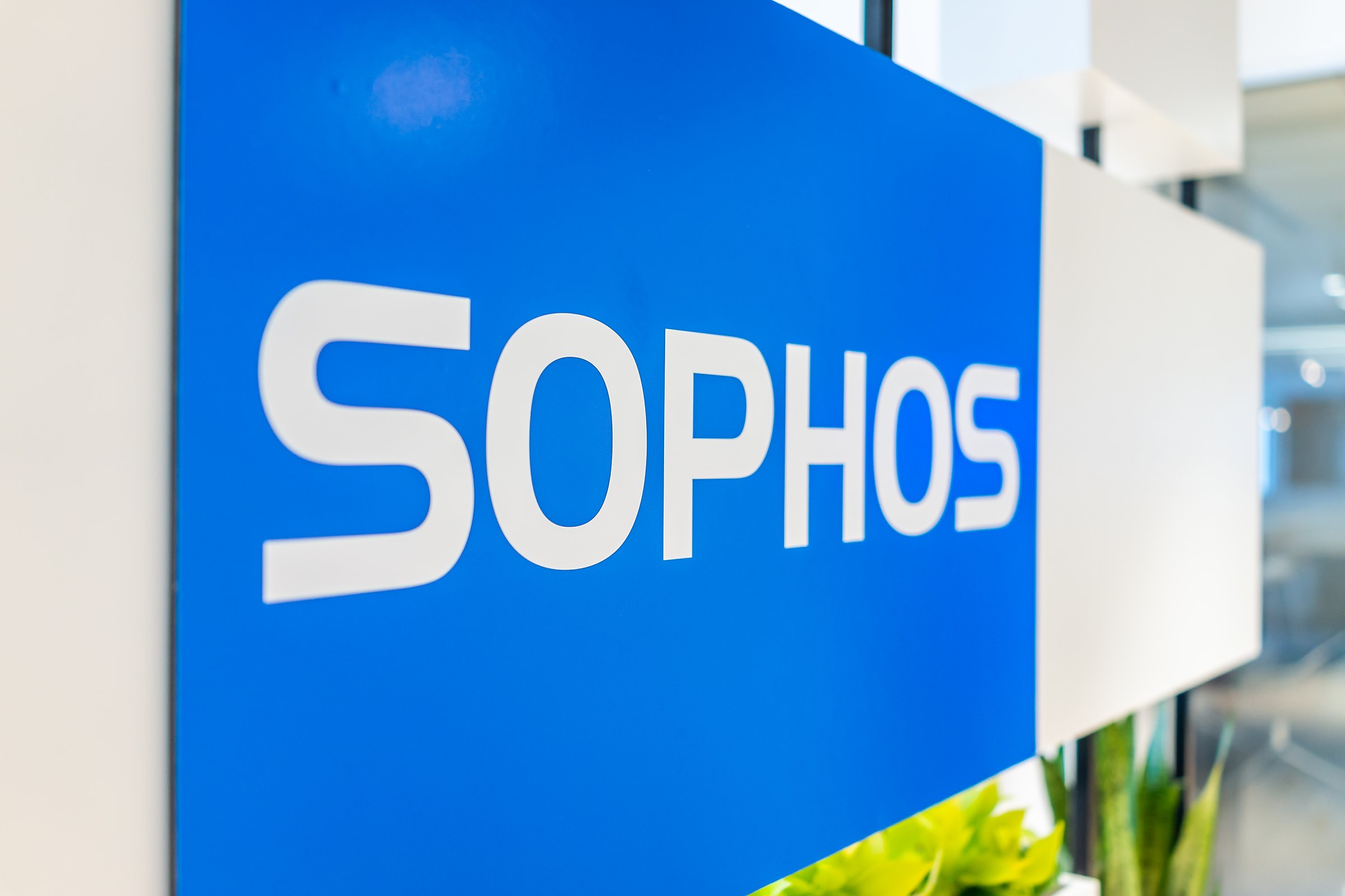 Reston, USA - February 2, 2019: Side closeup of blue sign in Sophos office building with modern architecture in northern Virginia for technology company
