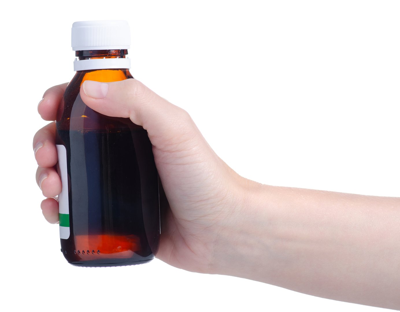 Plastic bottle syrup medicine medical with cap in baby hand on white background isolation