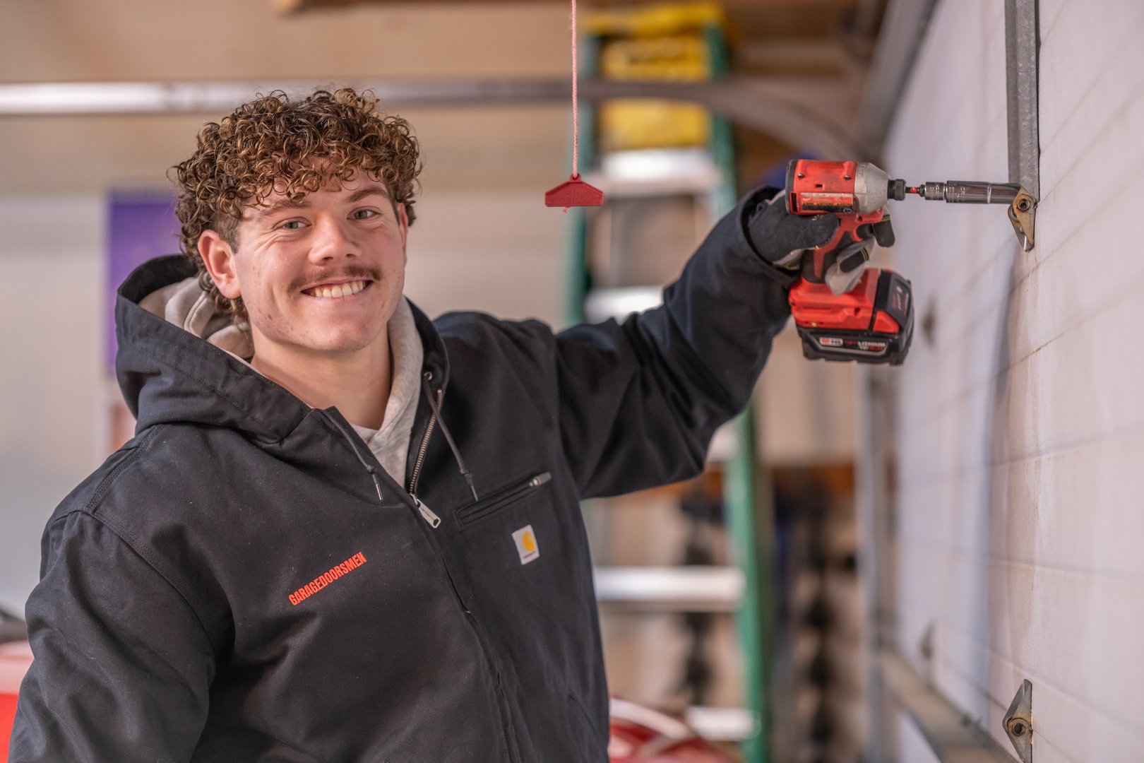 GarageDoorsMen technician at work