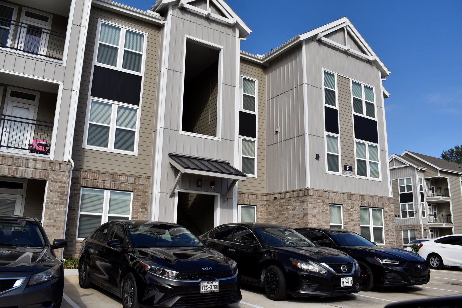 Houston, TX USA November 27, 2025 - A beautiful portrait of modern affordable apartment complexes in the heart of Houston Texas.