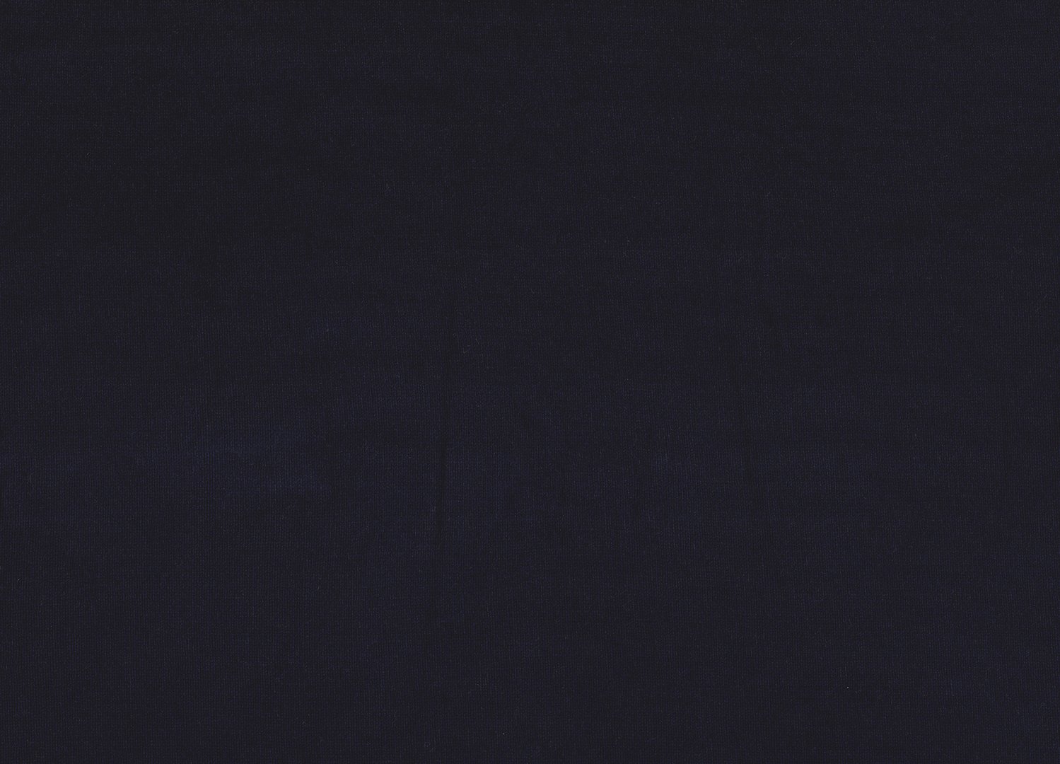 Warm black handmade sweater made of wool. Cold weather background.