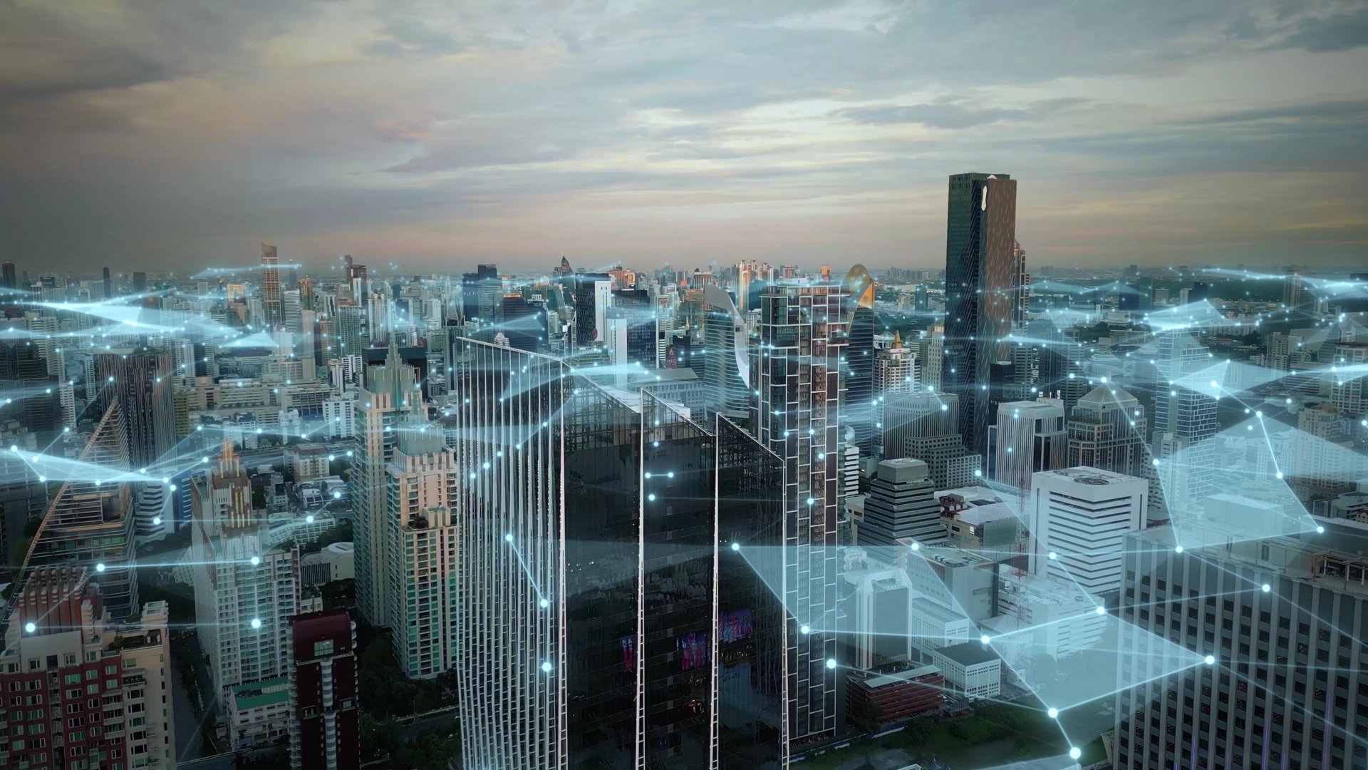 Cityscape of modern smart city with 3D digital graphic of internet web connections above skyline skyscrapers buildings. Aerial