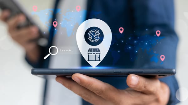 E-commerce business owner using mobile device to search for local marketplace locations on global digital map. Concept of online shopping, local business, and digital commerce strategy.