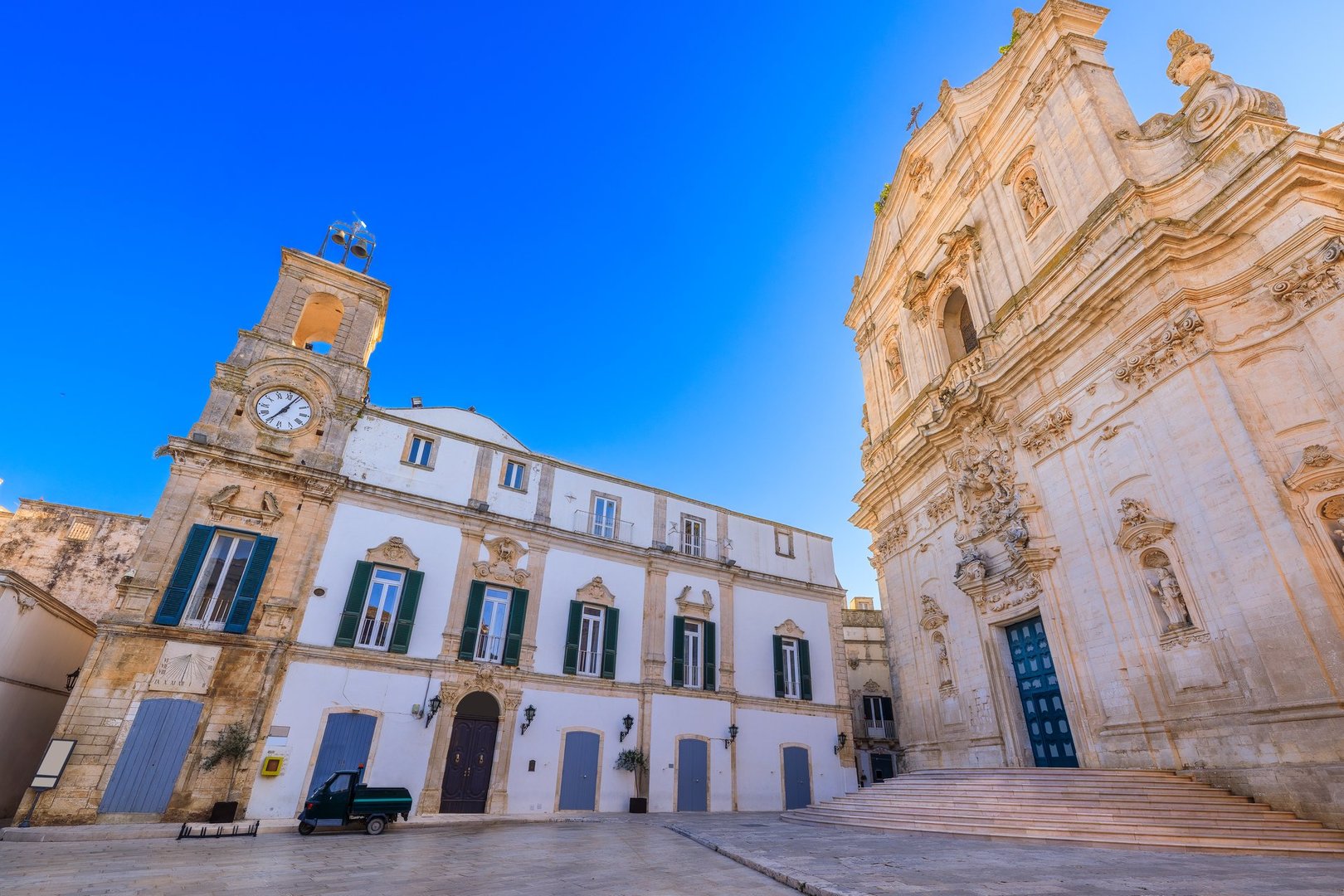 Martina Franca, Apulia, Italy. Piazza Plebiscito with the Clock Tower and the San Martino Church