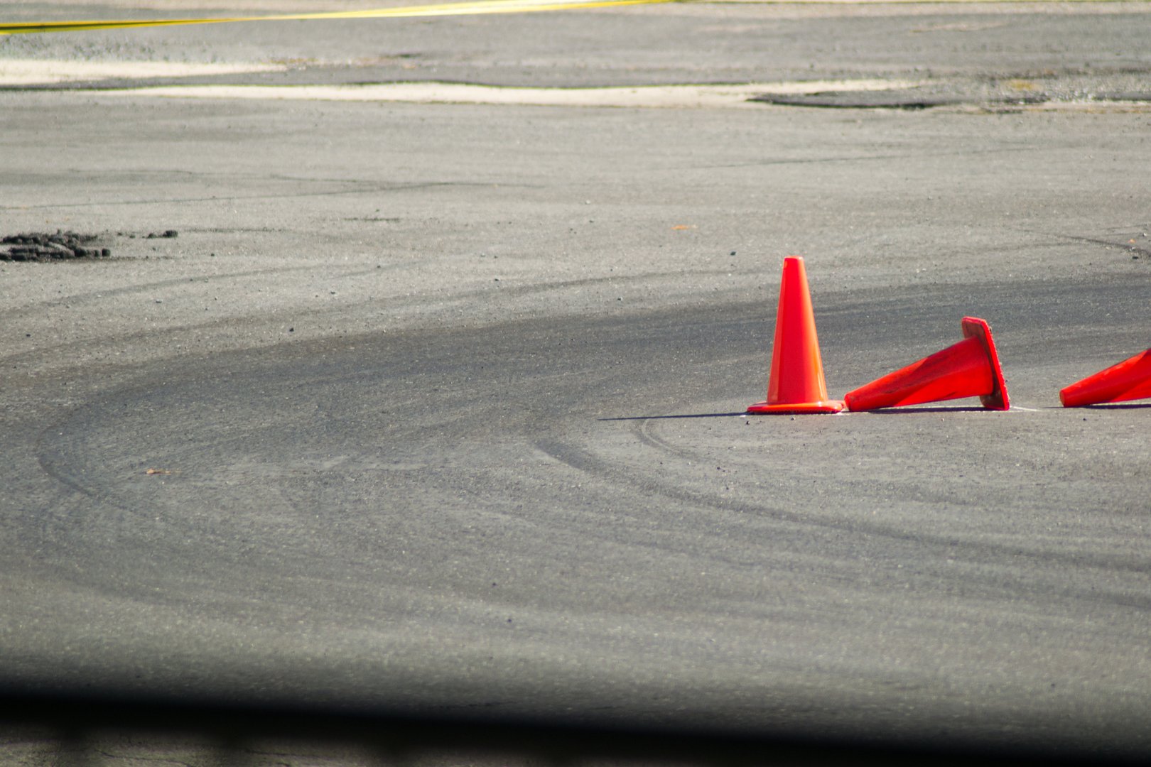 Autocross cones with tire marks around it