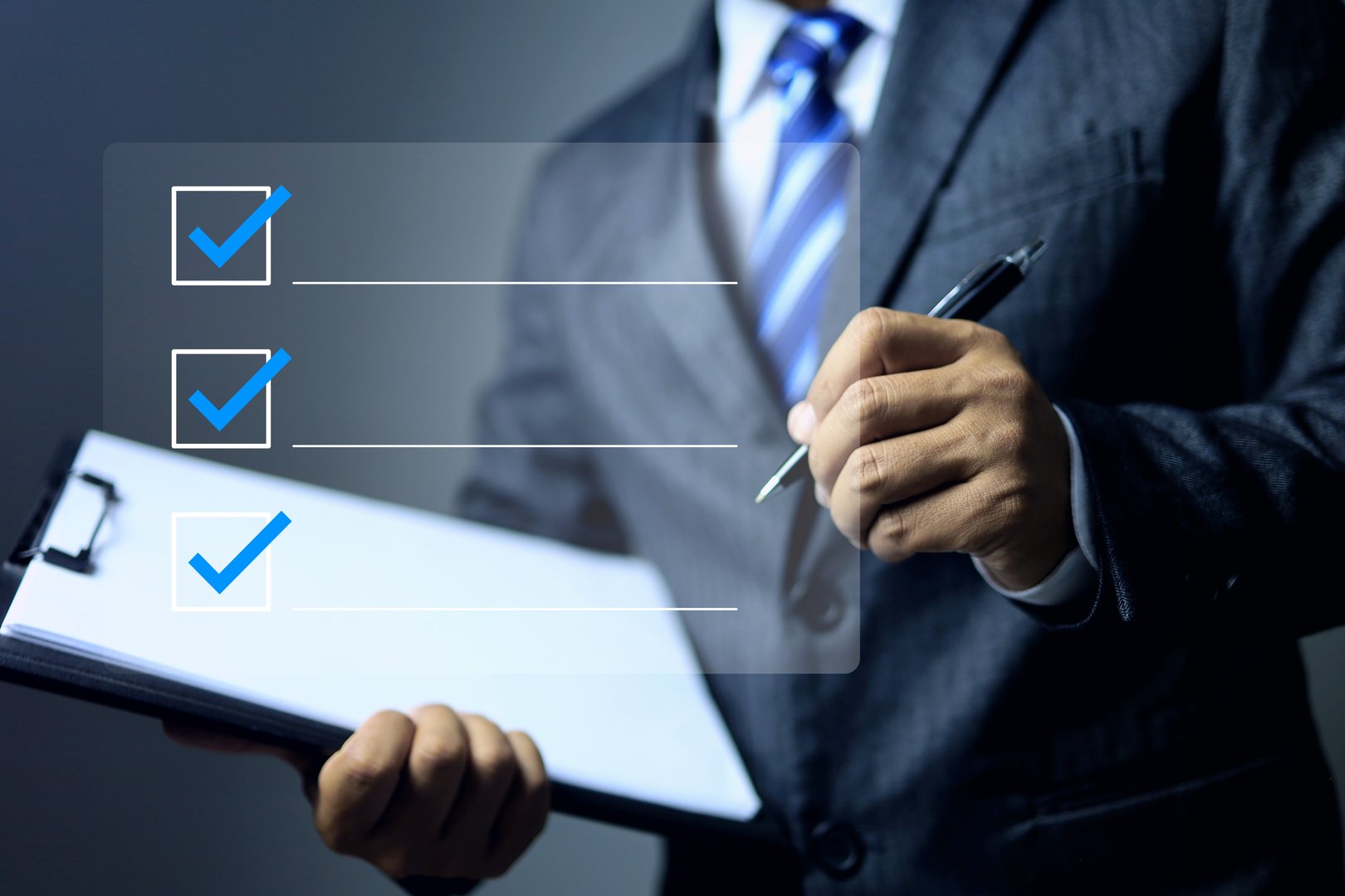 businessman holding document clipboard and ticking checkmark to approve on the task