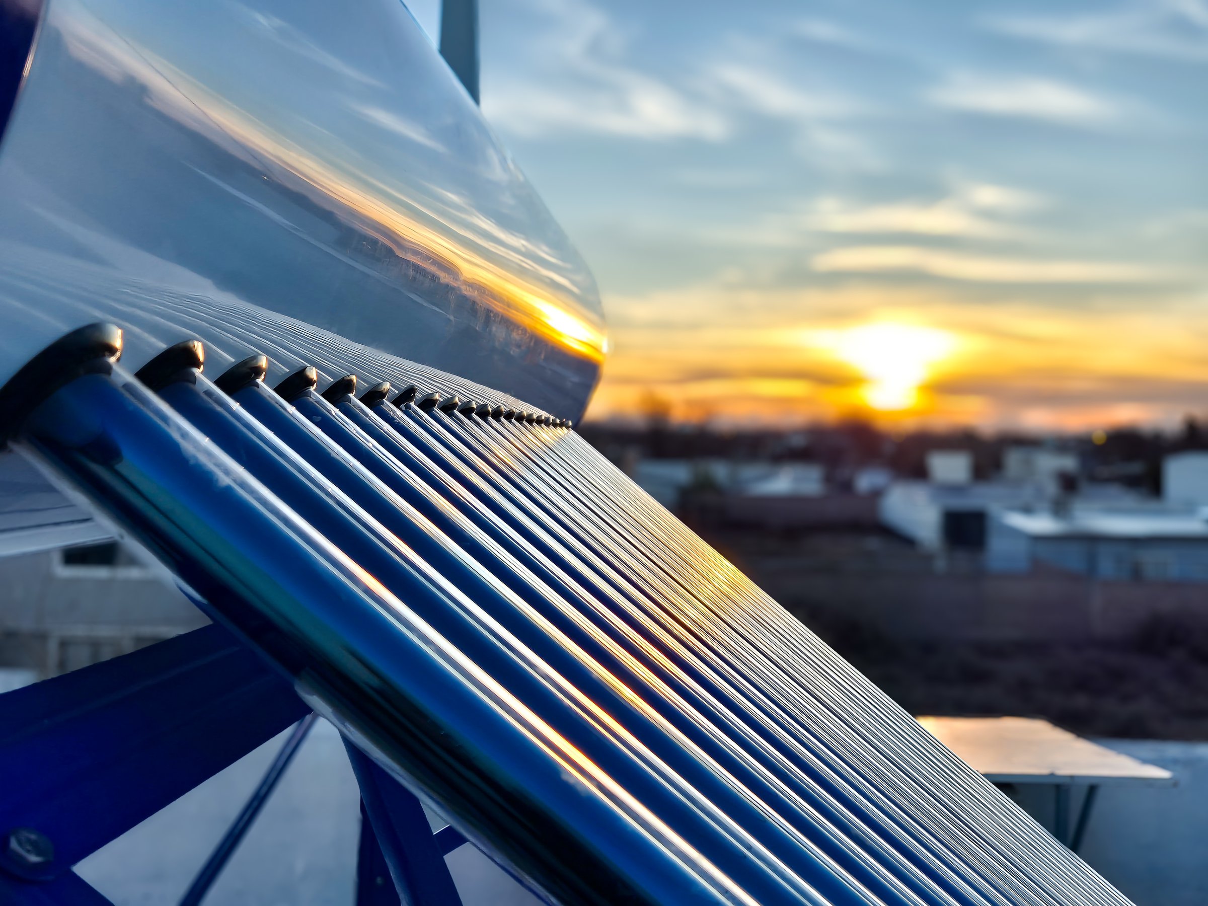 solar hot water tank at sunset