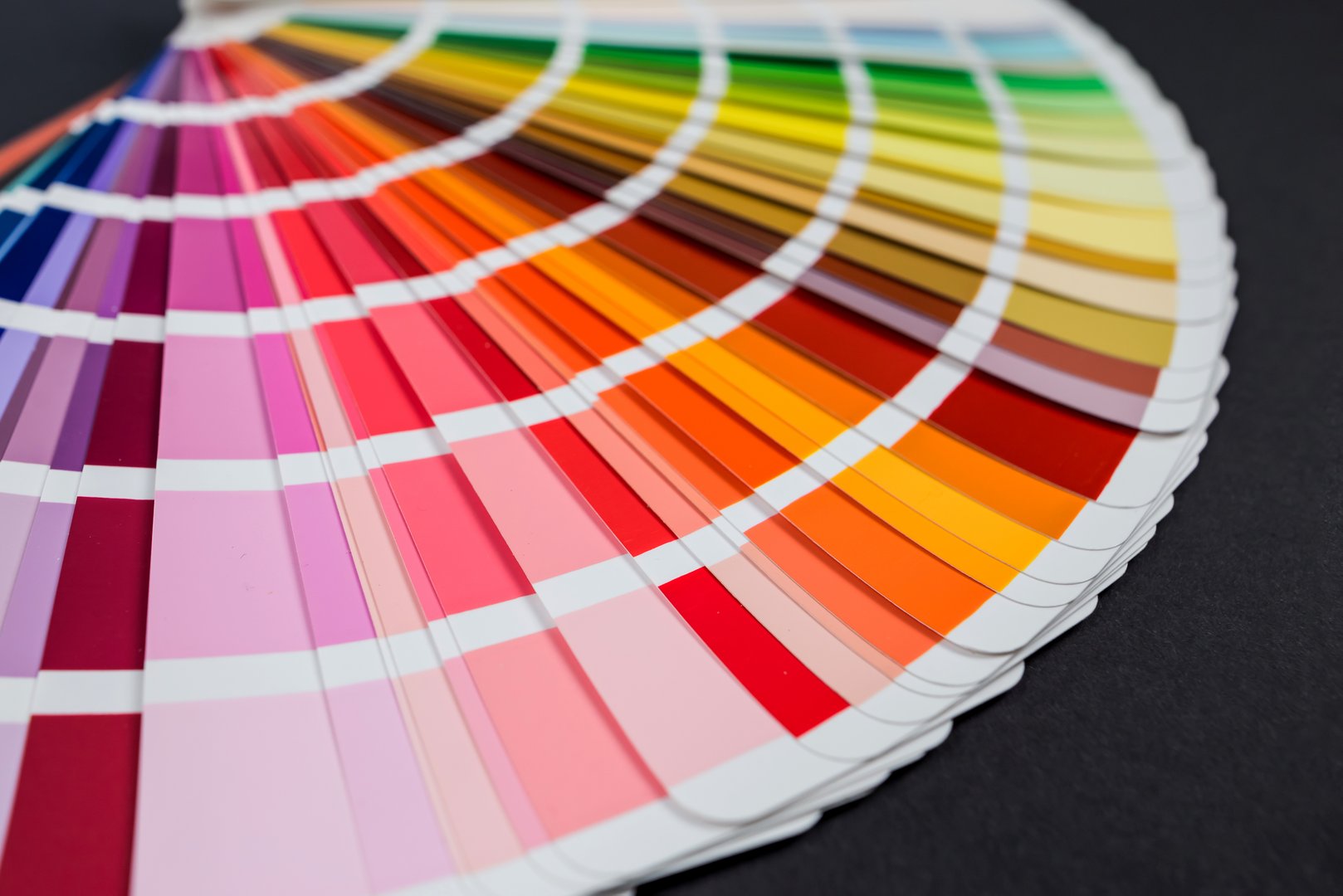 Close-up of catalog of paints with a various color palette