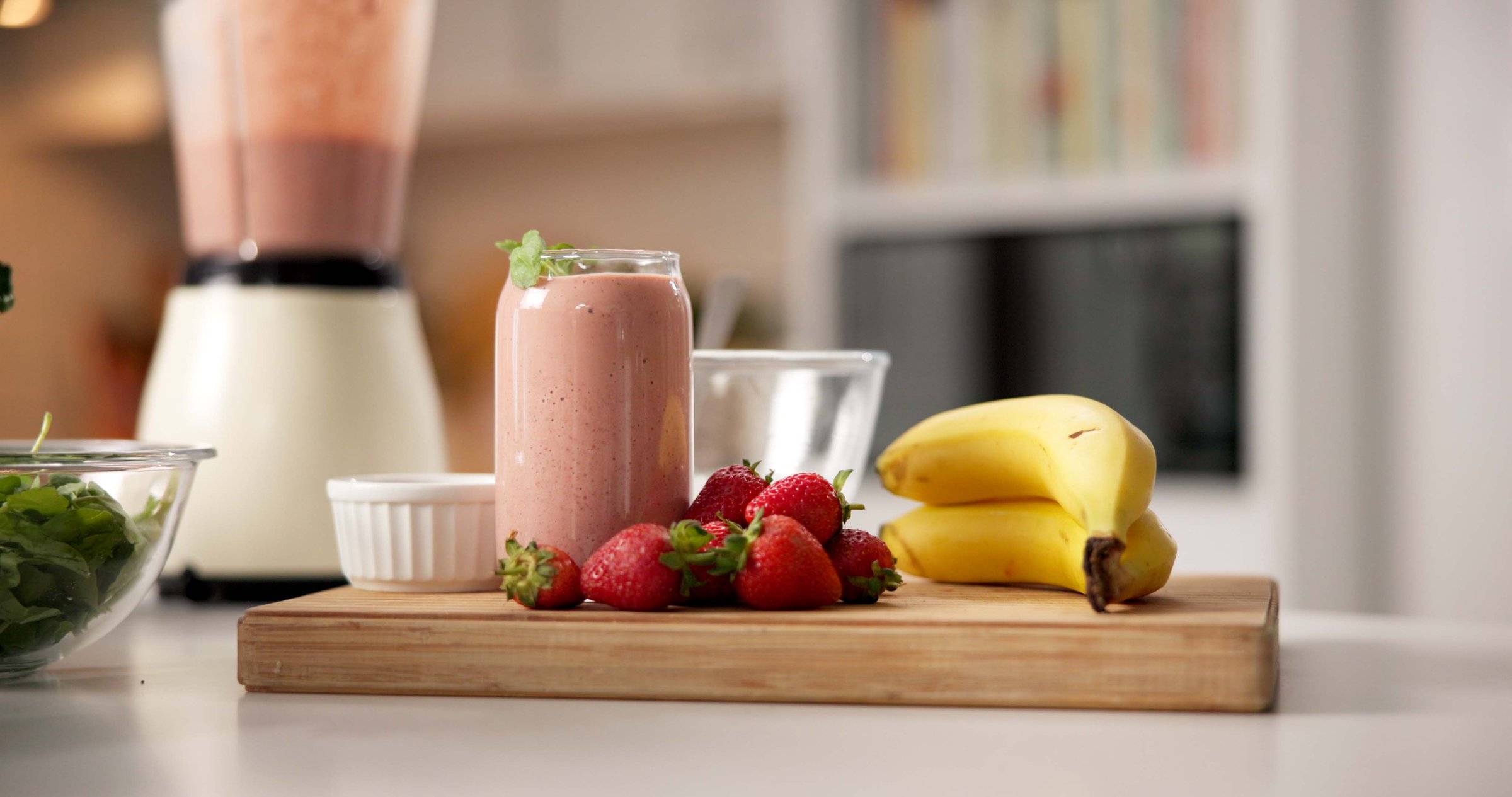Fruits, healthy and smoothie glass at house of nutrition drink, detox benefits and weight loss process. Ingredients, prepare and organic beverage of natural diet, protein shake and digestion wellness