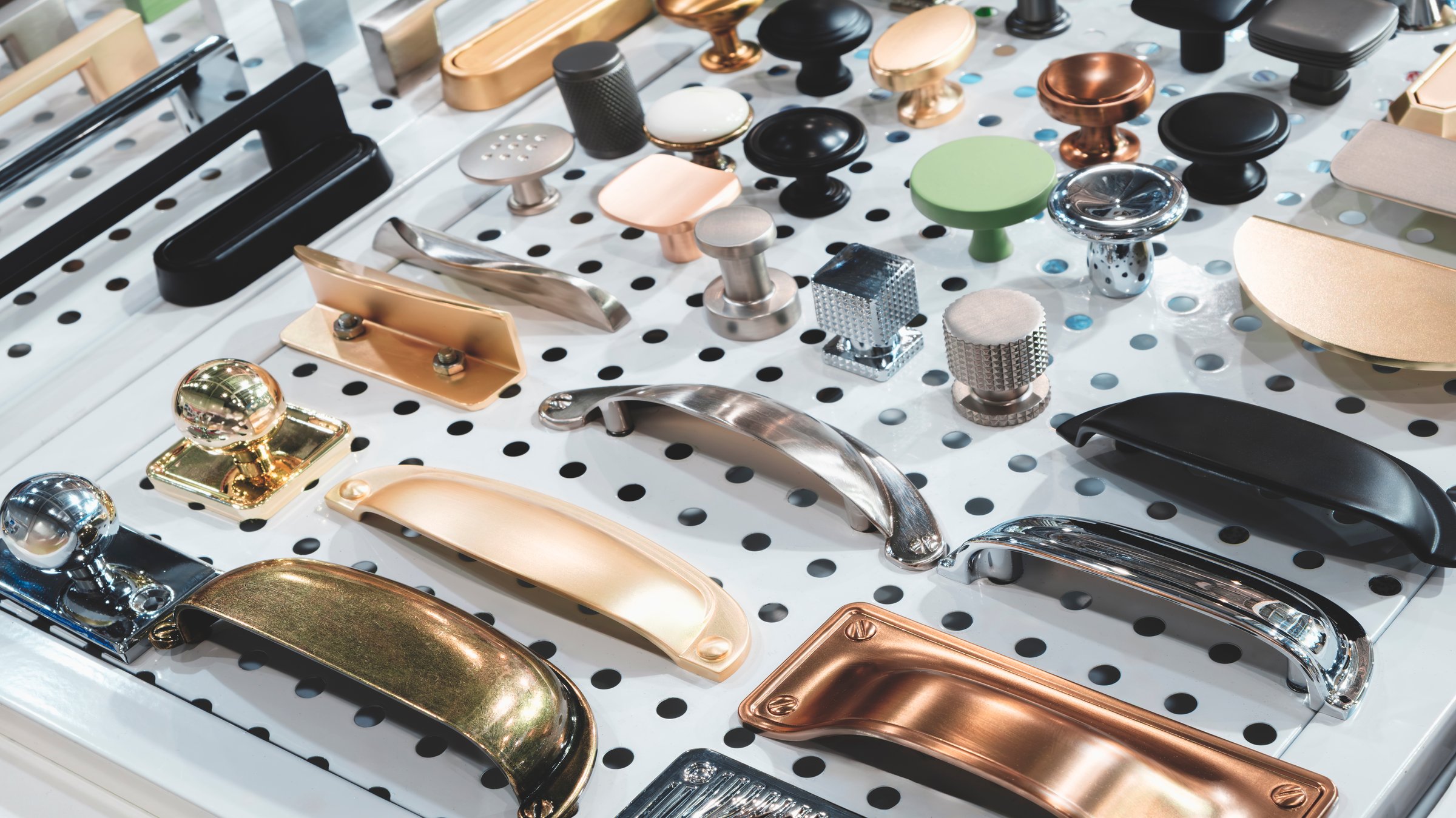 Furniture fittings for installing cabinet doors, handles for doors, cabinets and drawers.