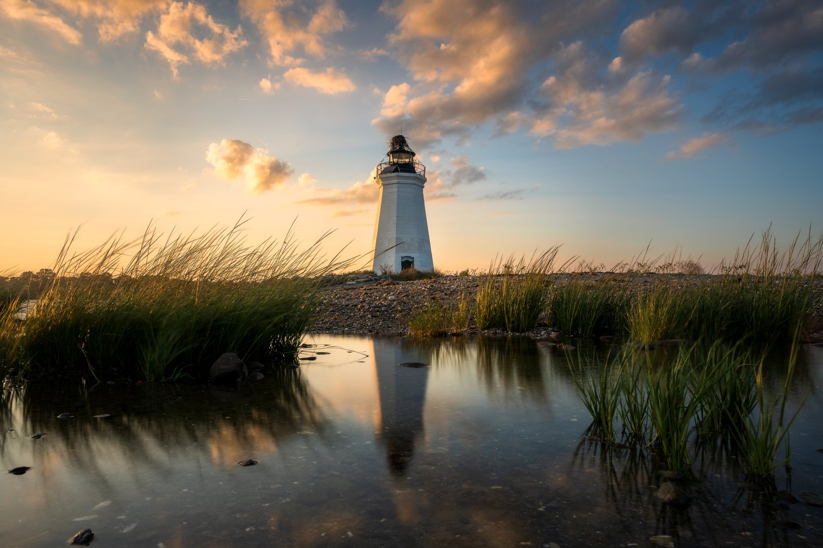 A beautiful sunset at Fayerweather Island Lighthouse in Connecticut.